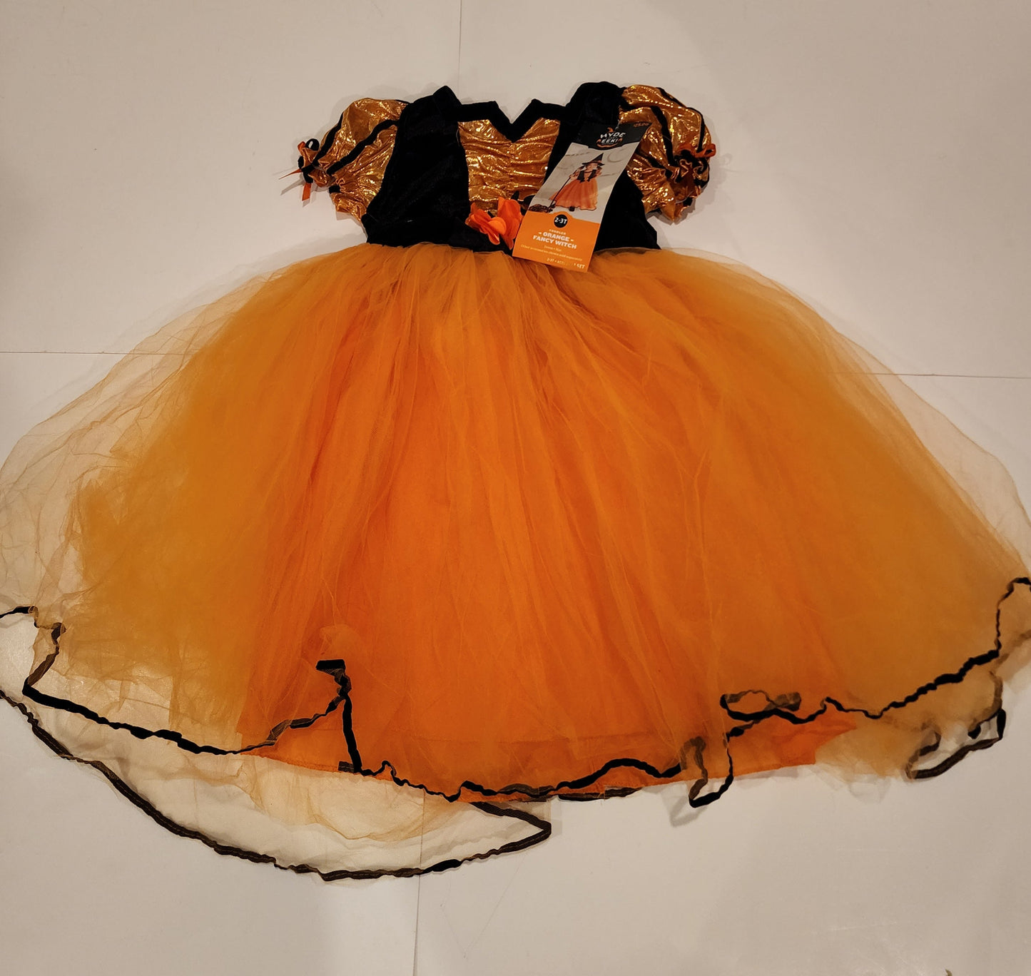 #135 girls size 2-3T orange fancy witch dress
