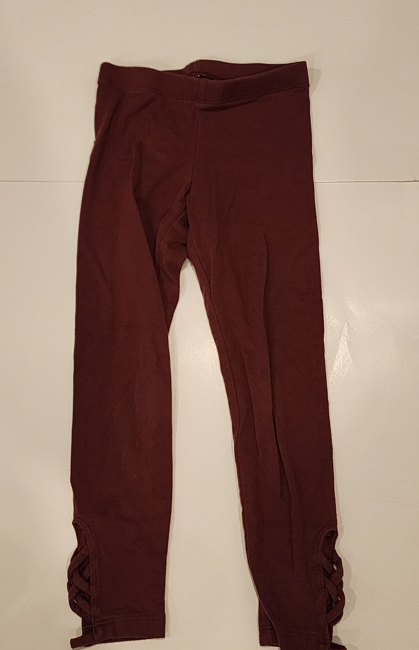 #135 girls size 5 Old Navy burgundy leggings with ankle cutouts