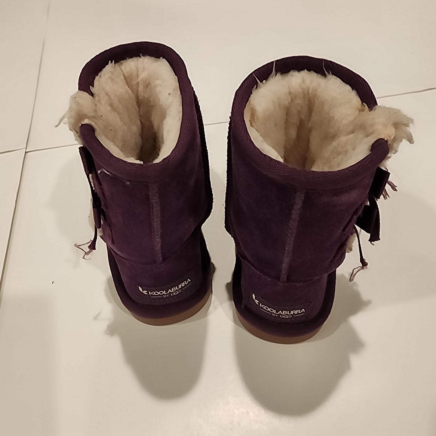 #135 girls size 9 Koolaburra by Ugg purple boots GUC