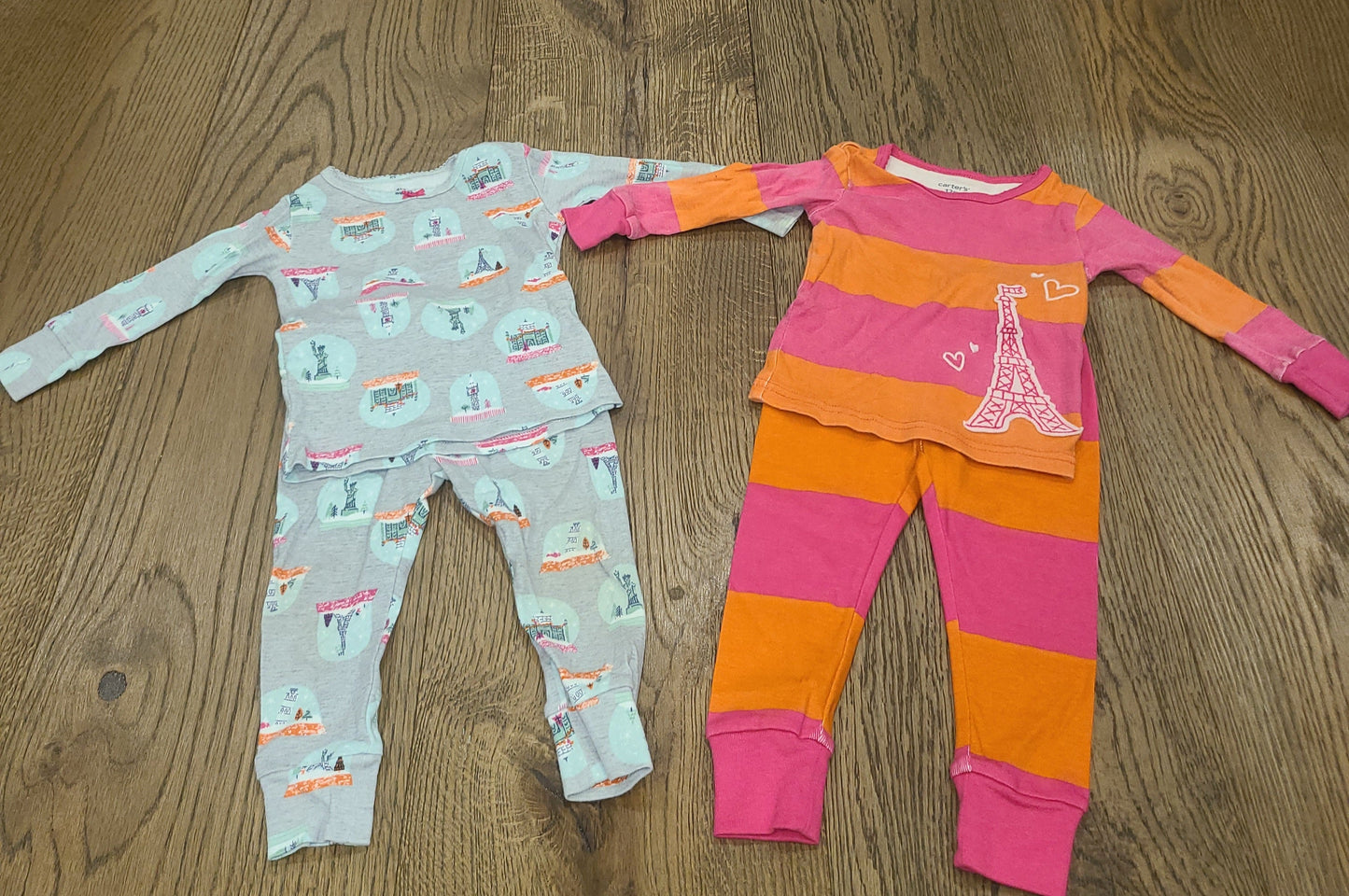 Seller #4 -Carter's 9- 12 month girls Travel themed pajamas sets