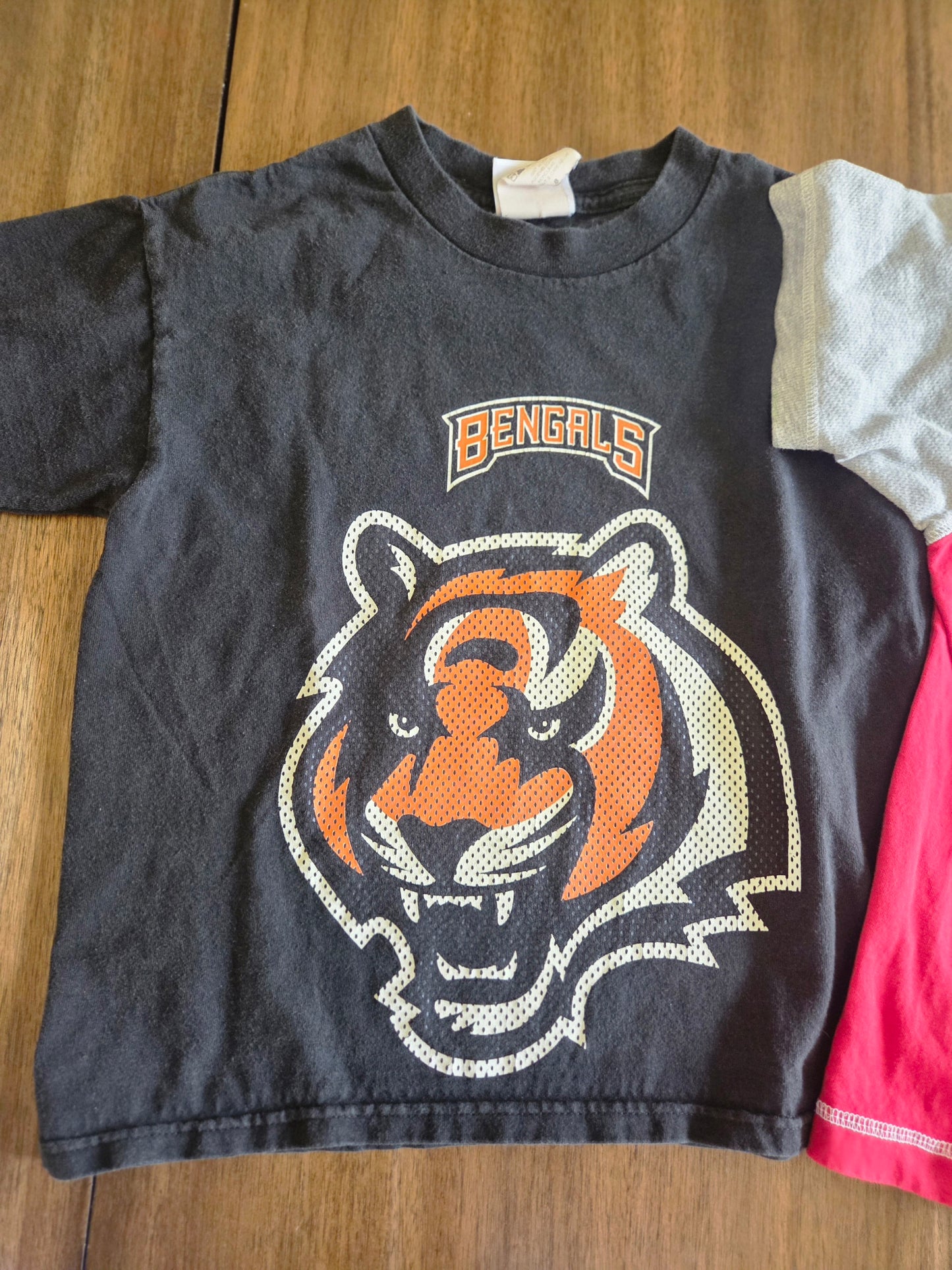 Seller 184 boys sports shirts size 8