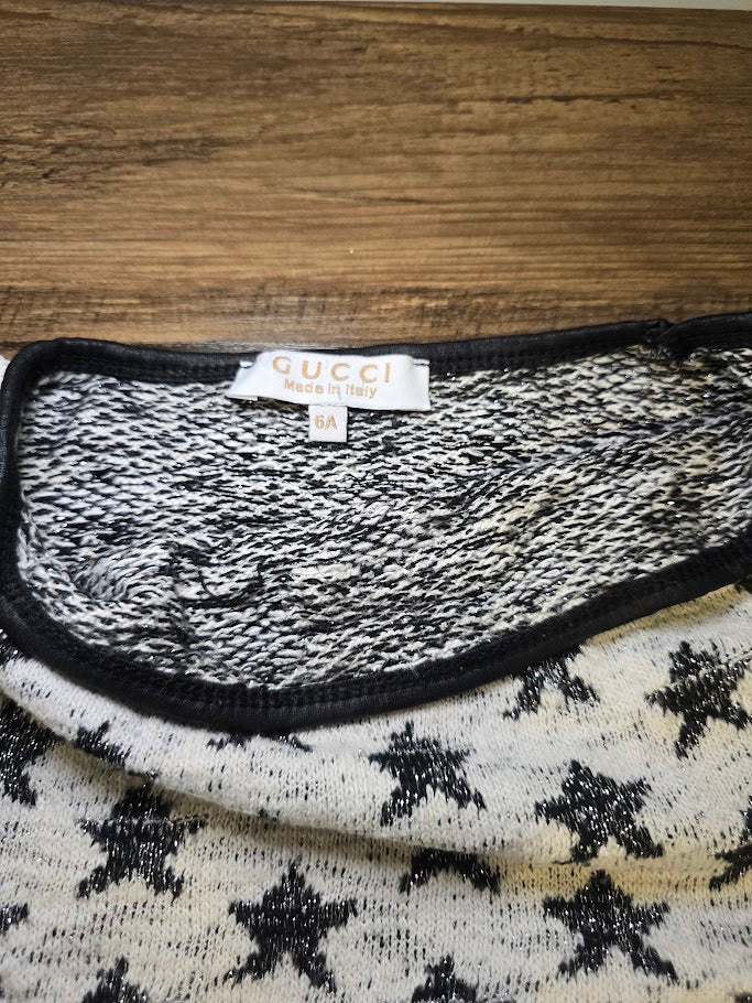 #131 Star sweater girls sz 6