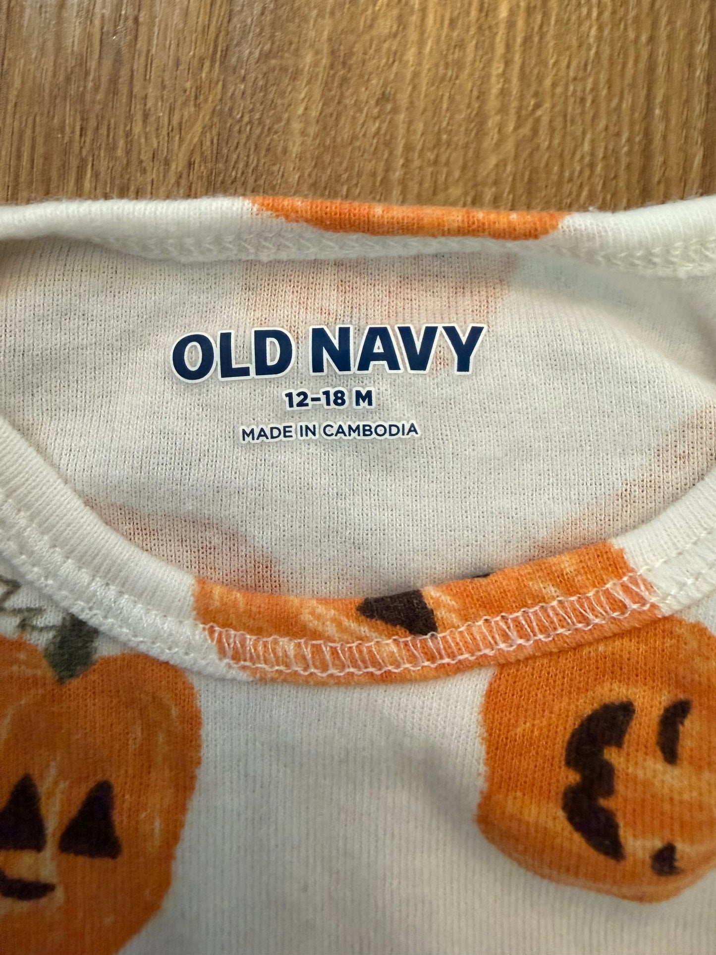 #6 - Old Navy Pumpkin Long-Sleeved Onesie Bodysuit - 12-18 months