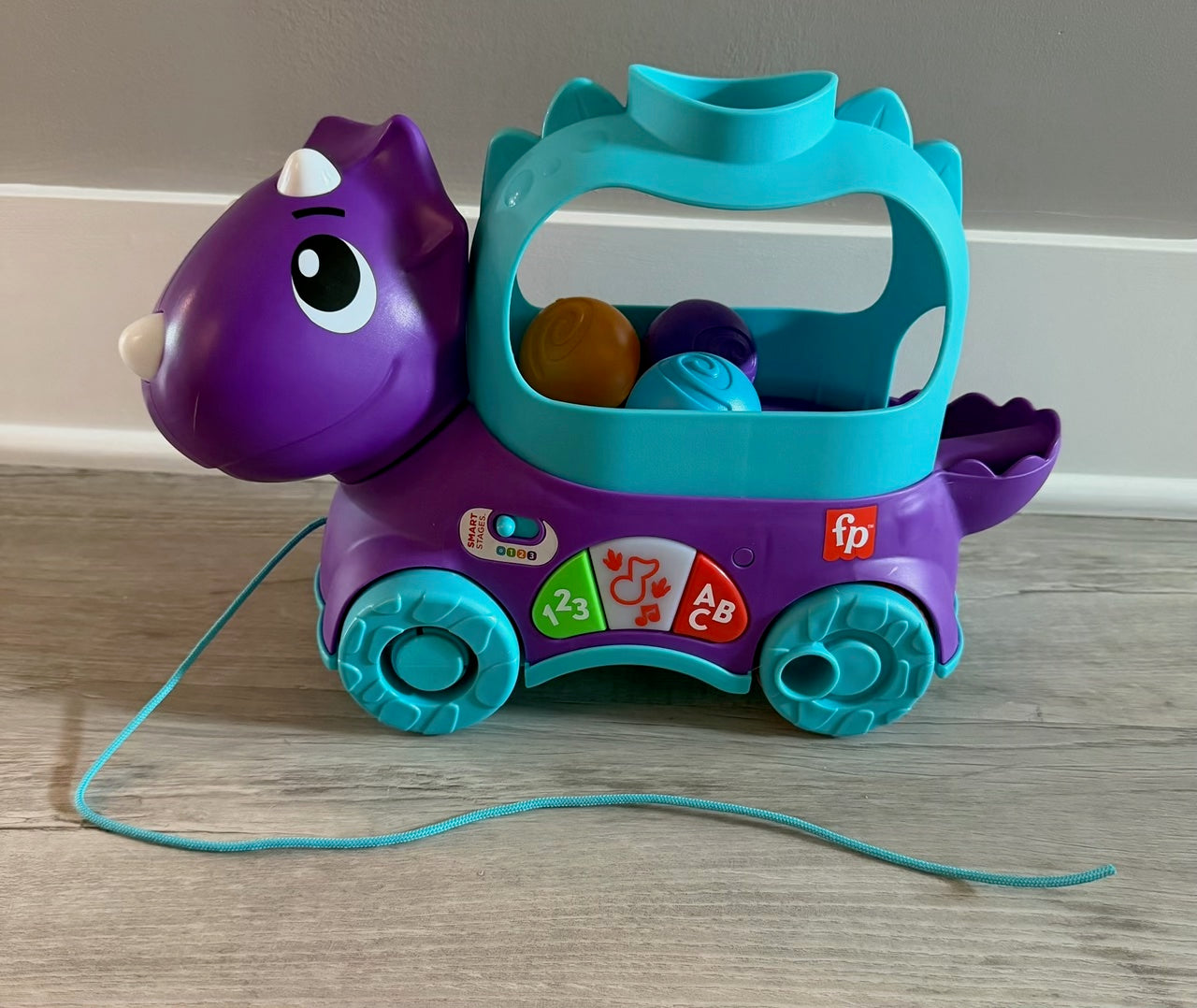 #42 Fisher-Price Poppin Triceratops