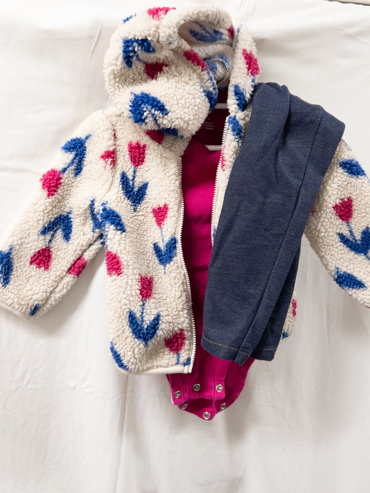 #151 girls carters 9 month old outfit with pink onesie, jeans, and floral fleece jacket