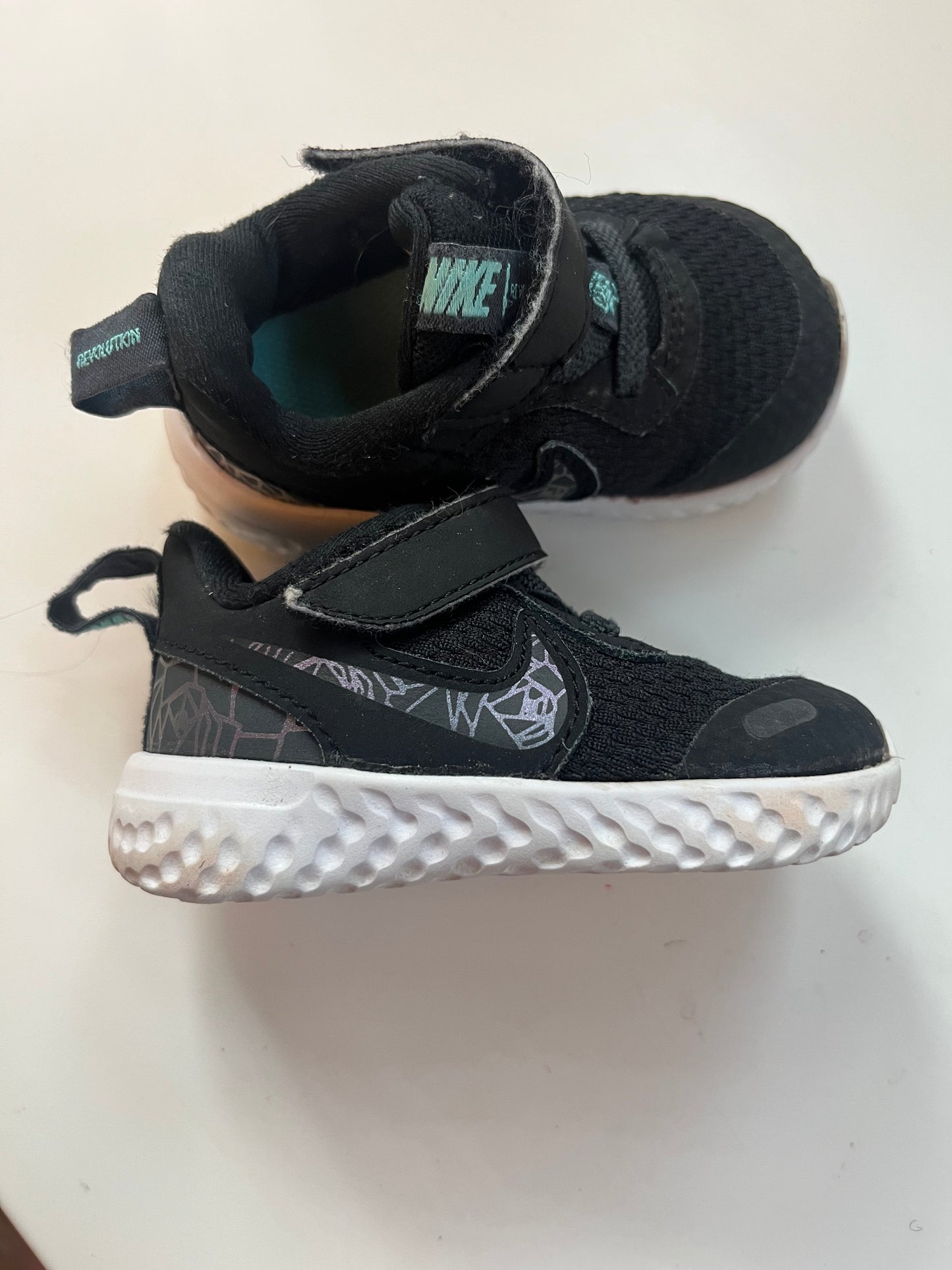 Seller #20 black Nike size 4c