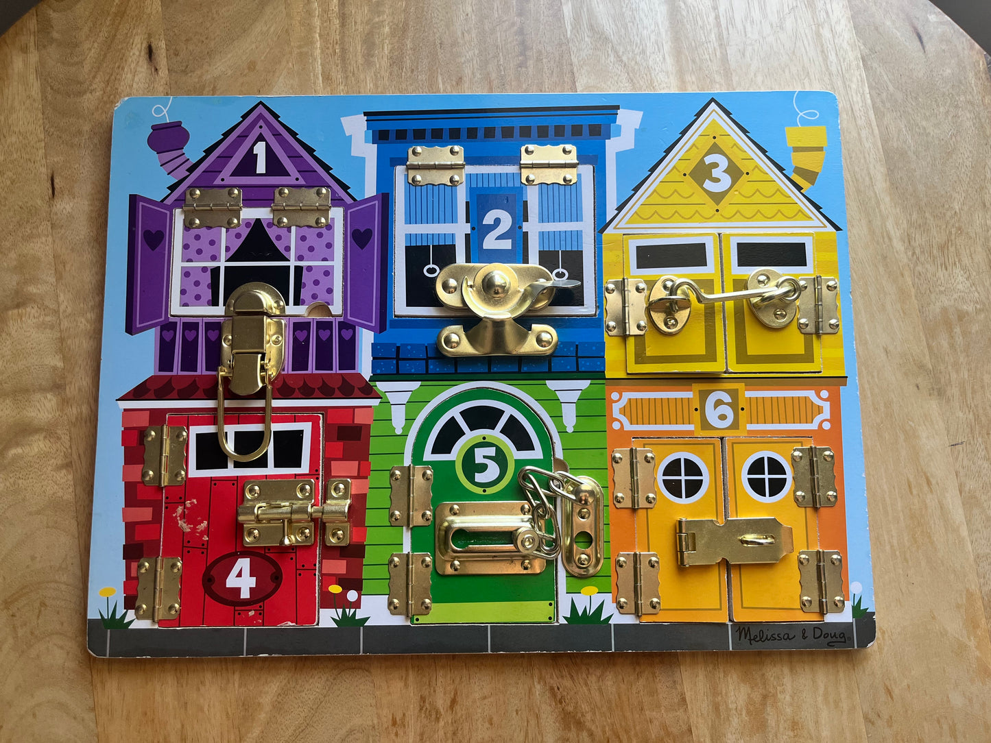 #97- Melissa and Doug Latches Board