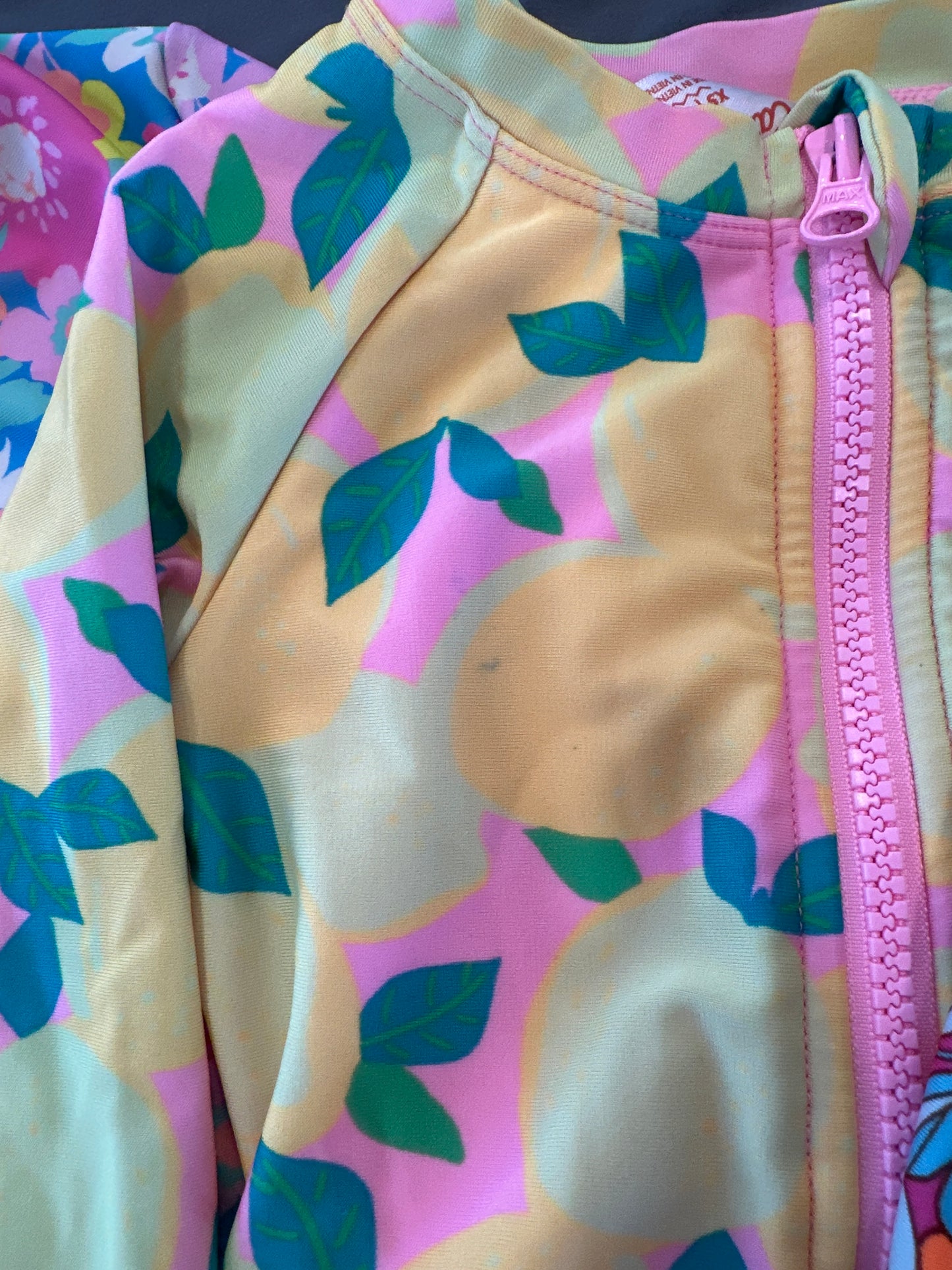 Seller 125, girls 4/5 long sleeve cat and Jack swim