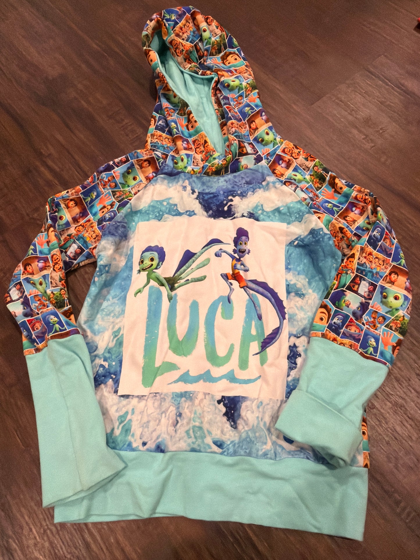 #107 like new Disney Luca size 6-9 grow with me hooded sweatshirt