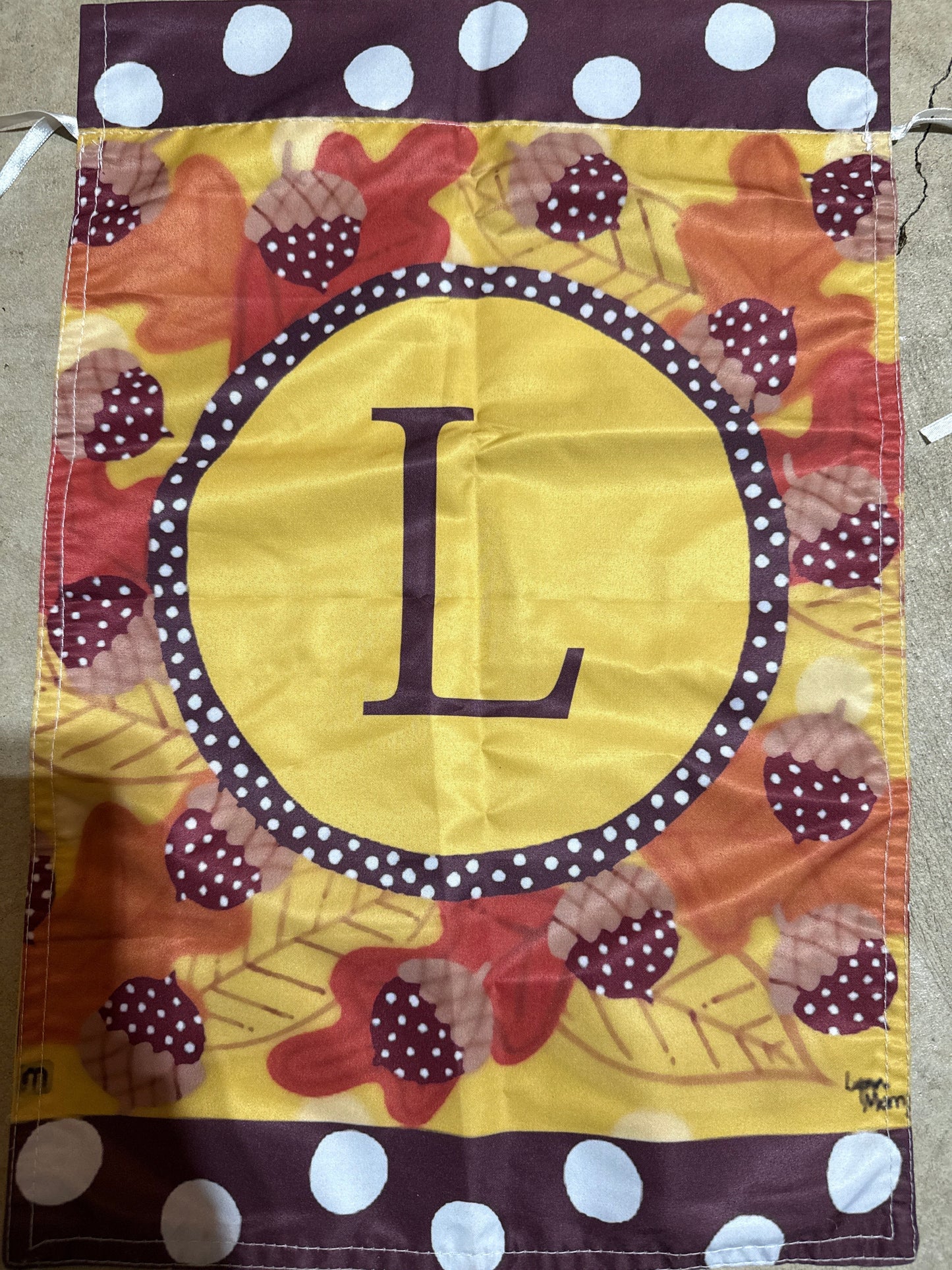 Seller #216 Fall yard flag with initial “L”