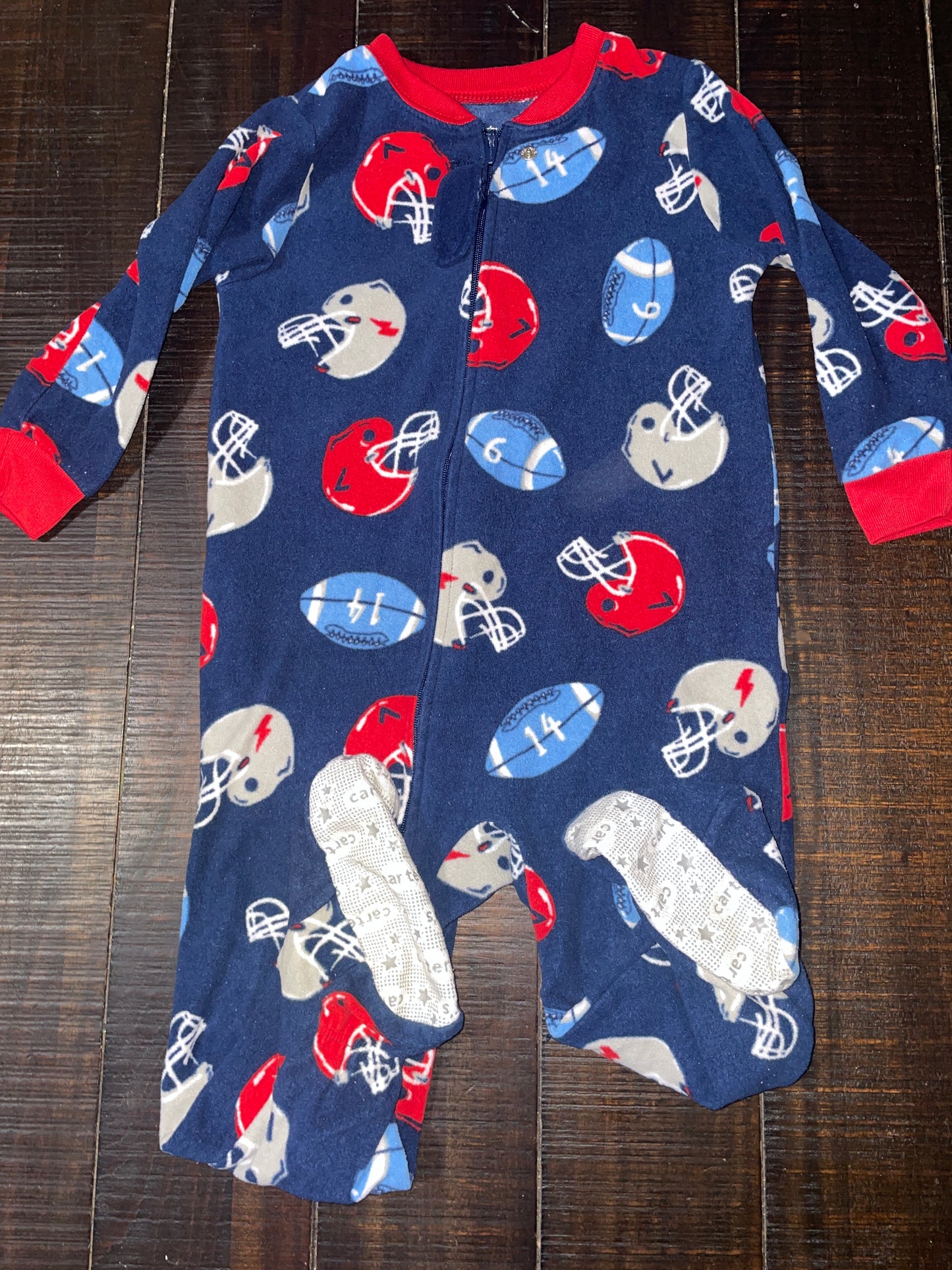Seller #121 Boys football footed sleeper 24 months