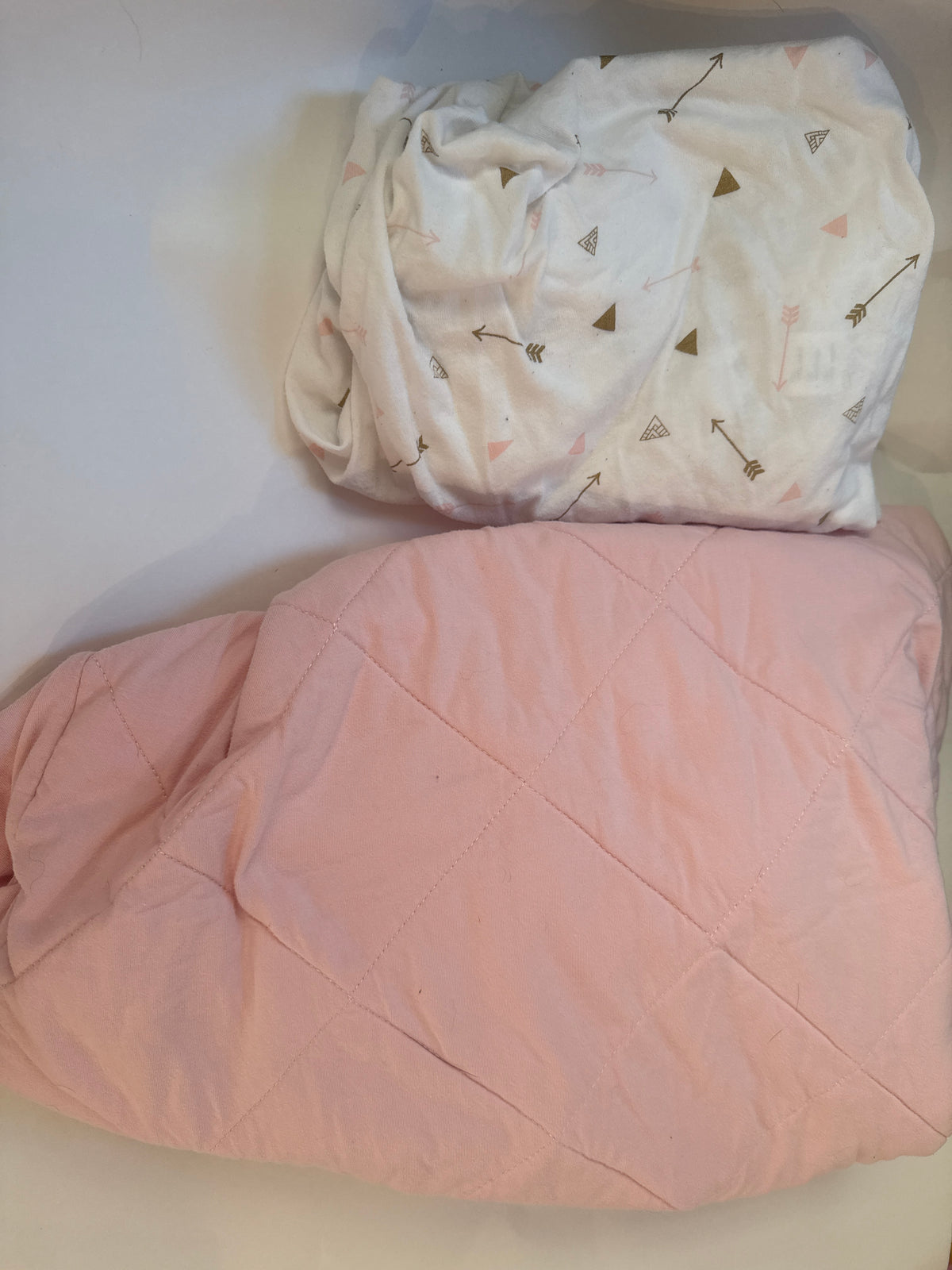 #170 Pack n Play pink mattress protector and pink and gold sheet