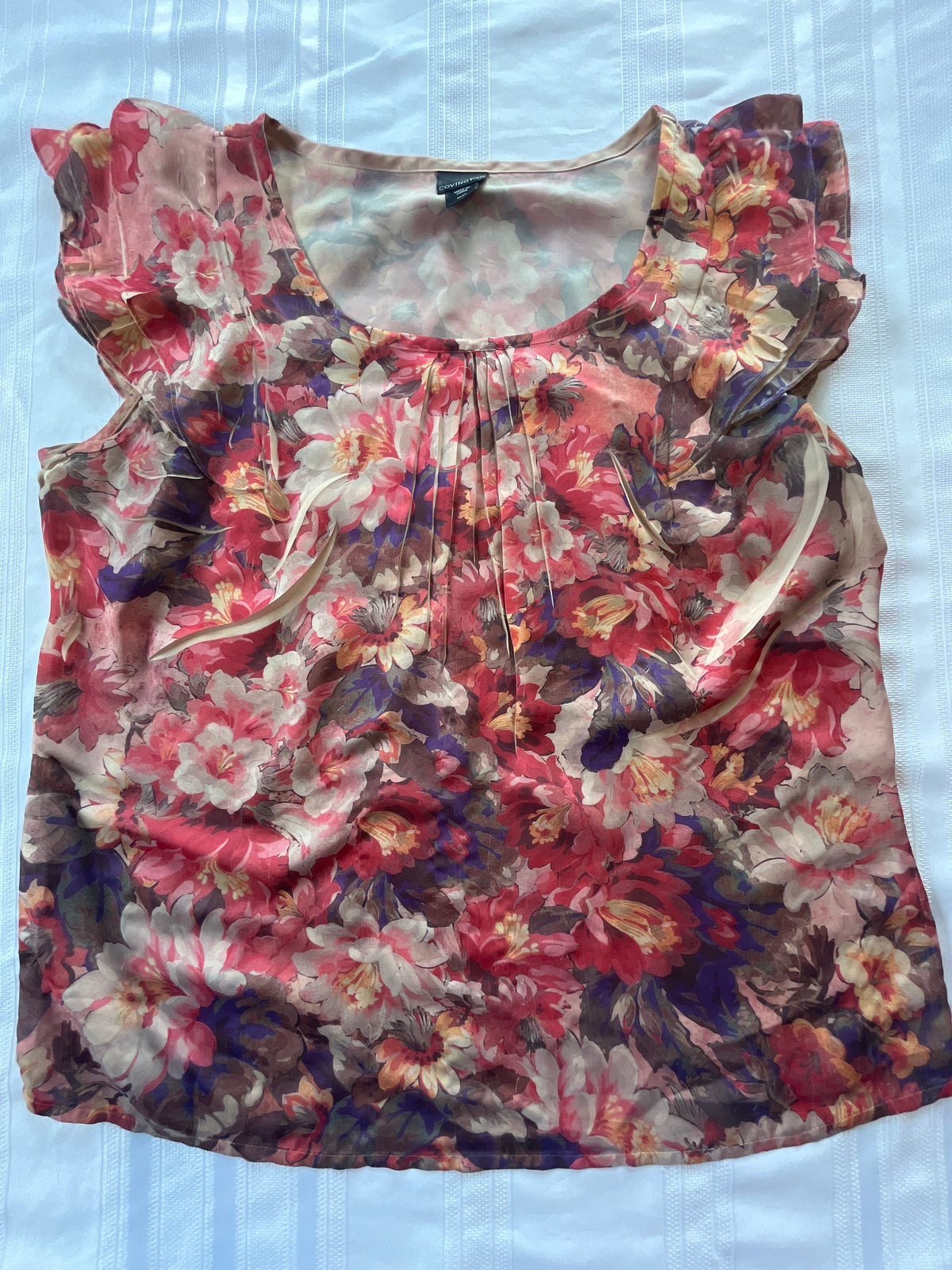 #43 Women’s M sleeveless shirt EUC