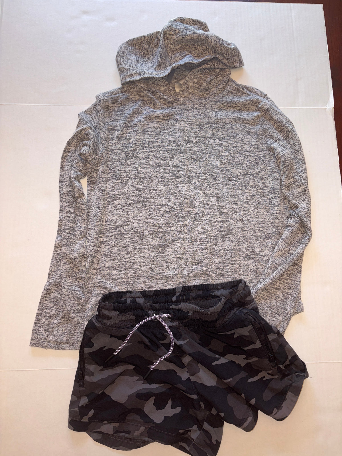 Seller 118 VGUC Athleta Girl camo shorts and gray thin hoodie. Size 12