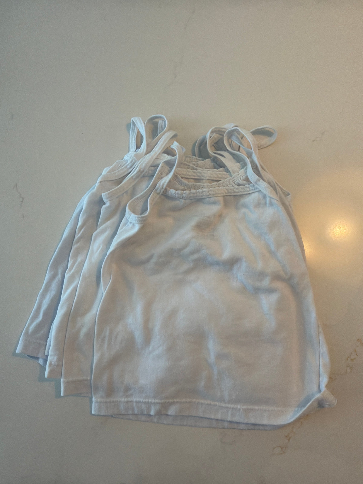#133 girls 4-5 tanks- we like to wear under shirts in the winter