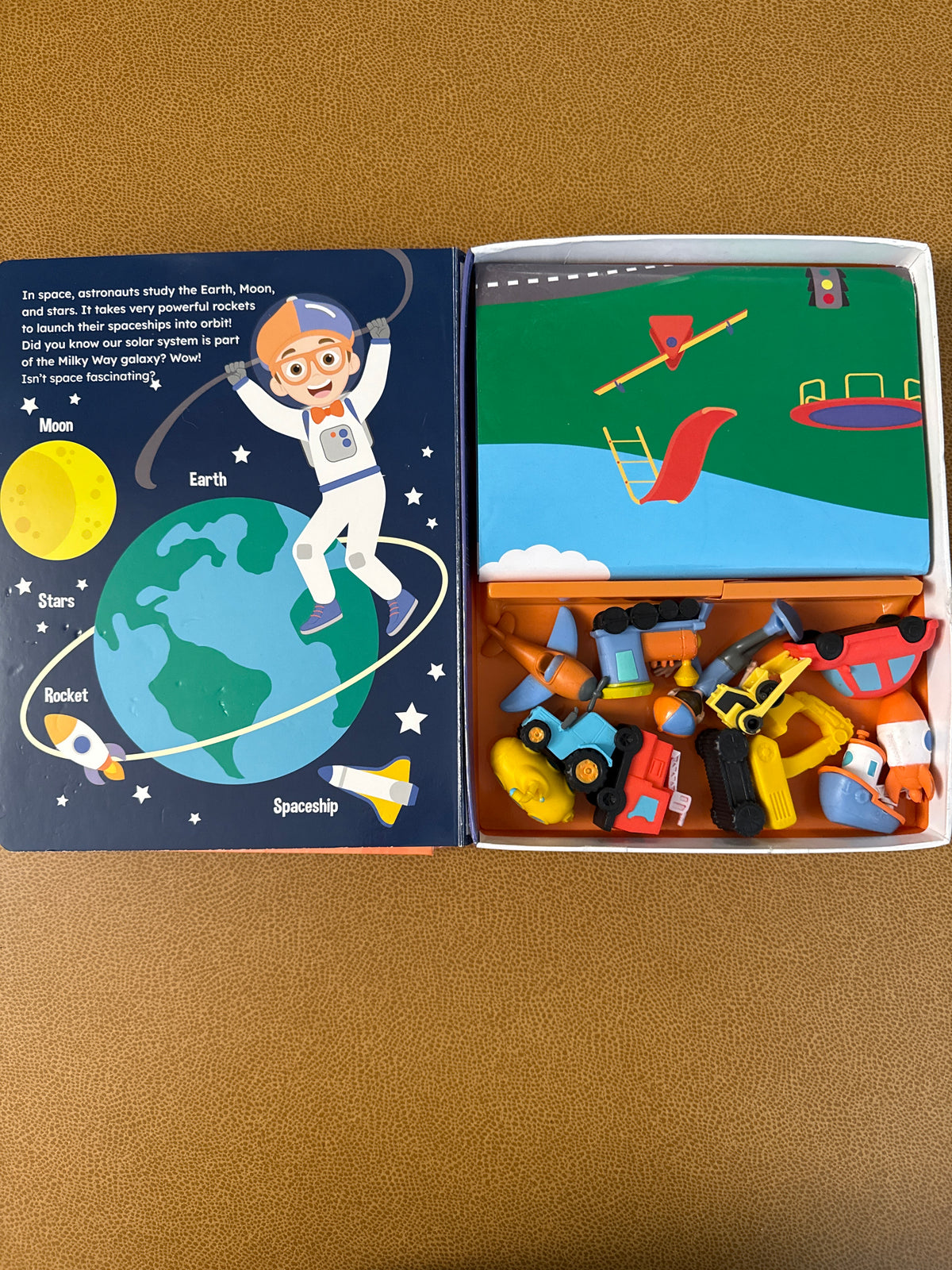 #87 Blippi busy book (story, playmat, and figurines)
