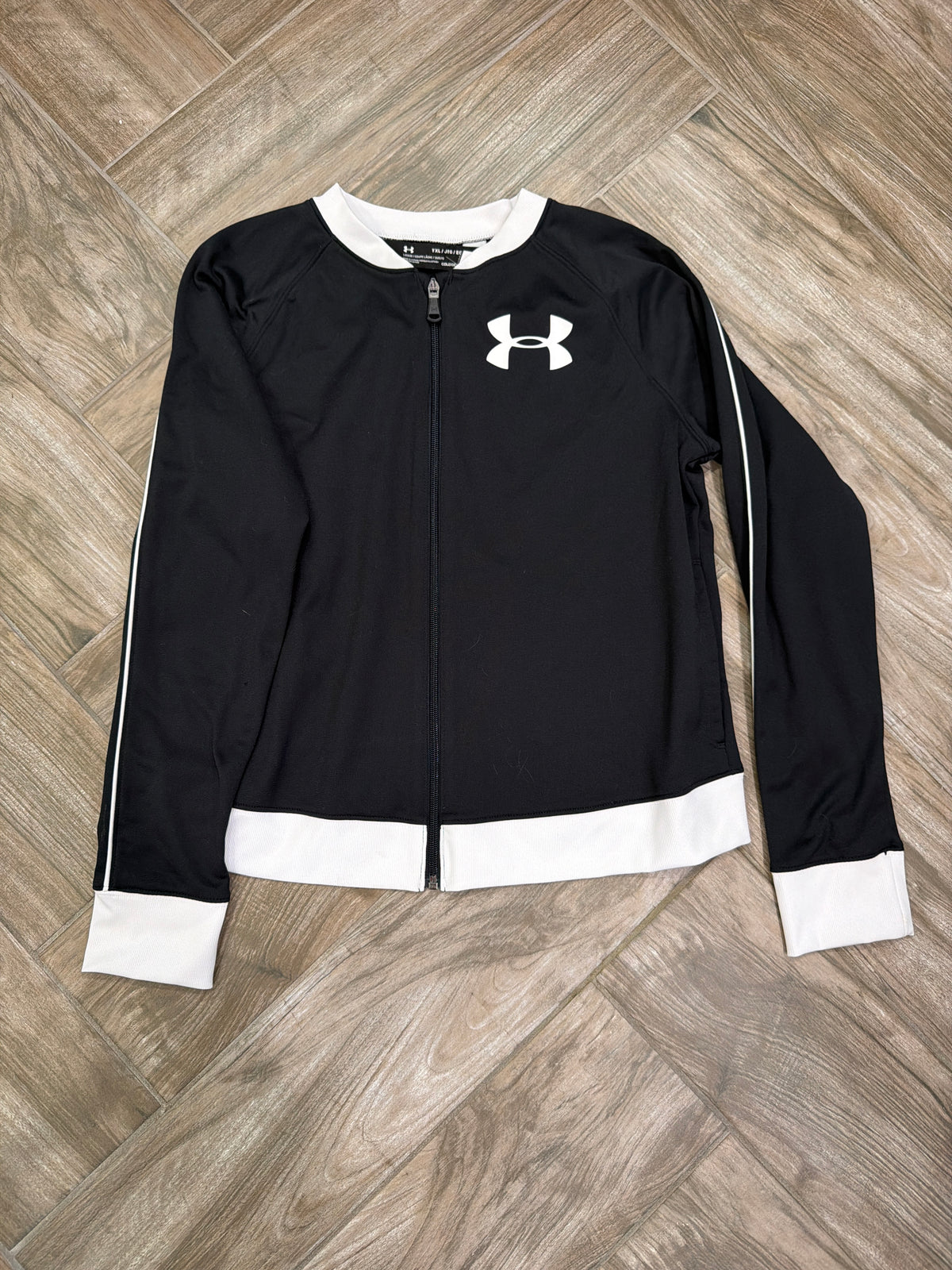 #198 Girls size extra large Under Armour zip up