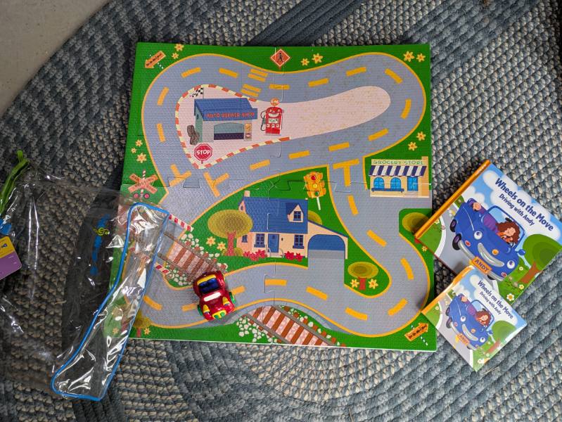 Seller 123 - Wheels on the Move Road Mats, Books, CD, and Car - reduced