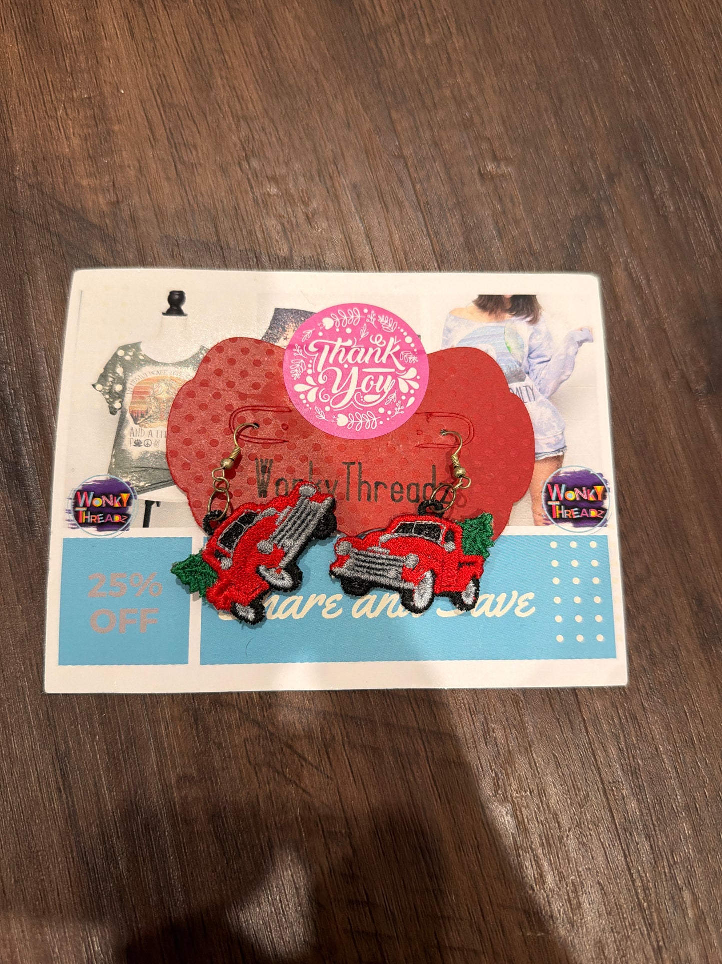 #107 new holiday red truck earrings