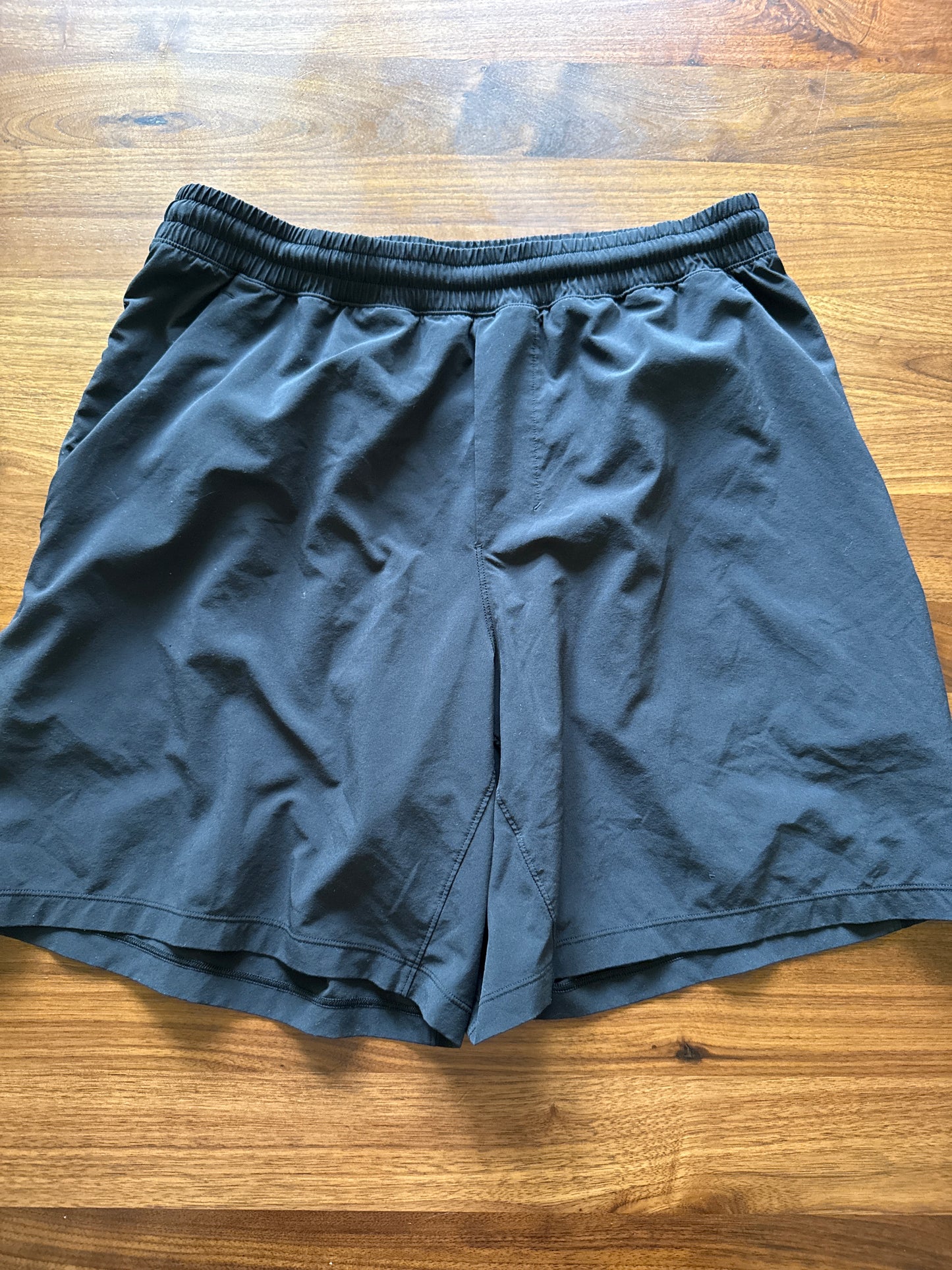 Seller 179 - men’s size L Lululemon black athletic shorts WITHOUT liner