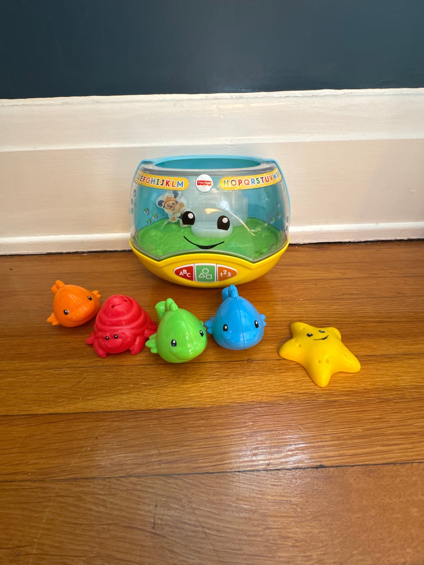 Seller #127 Fisher-Price fish bowl toy