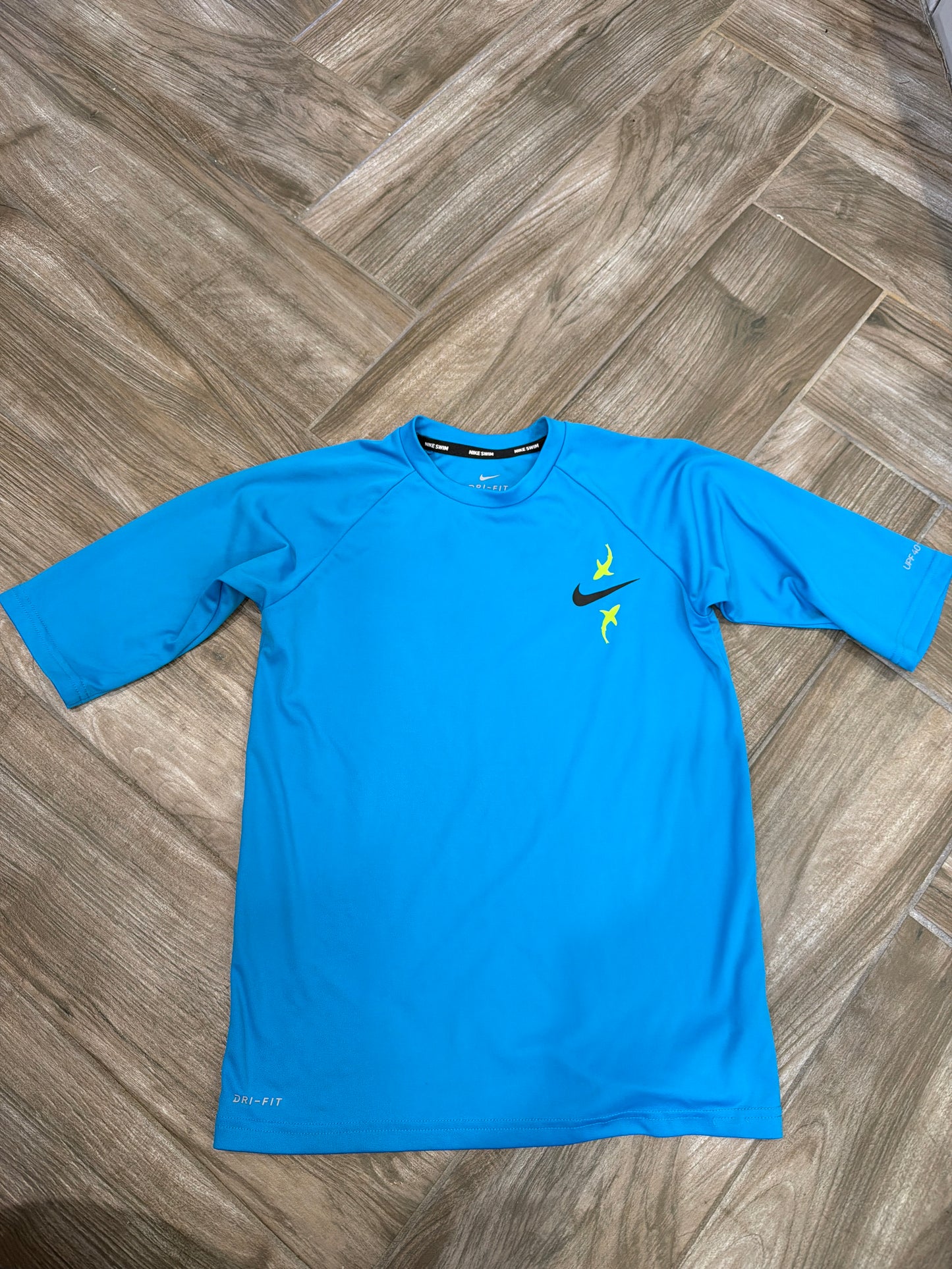 #208 Boys six Medium Nike swim shirt