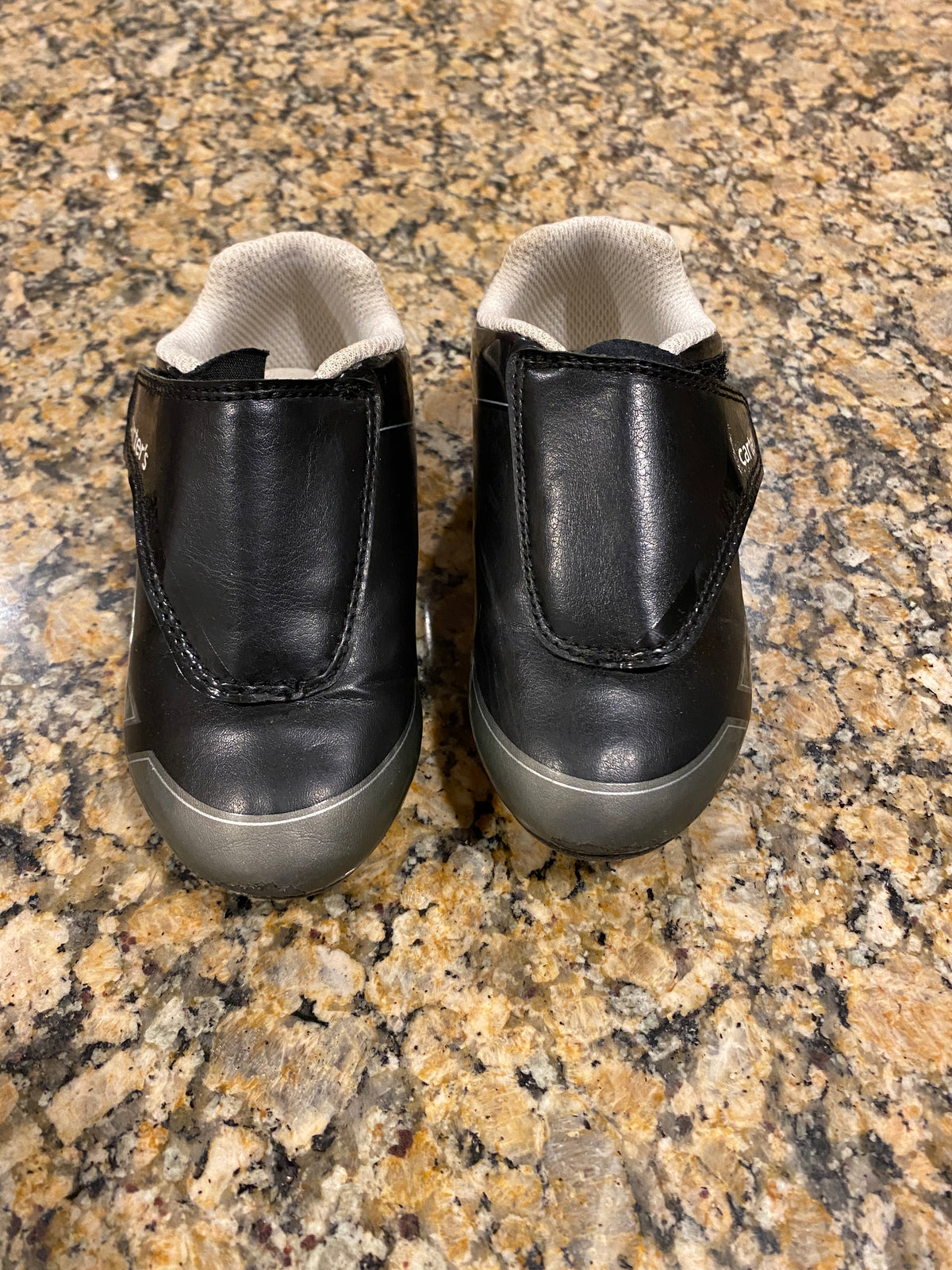 #63-kids cleats size 8