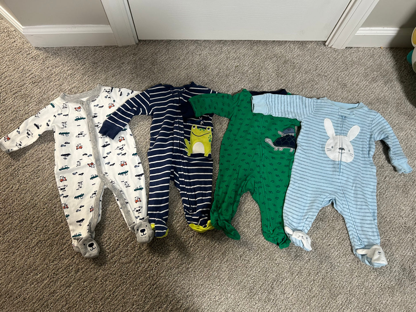 Seller #152 - set of 2 Carter's size 3 months fleece footed pajamas