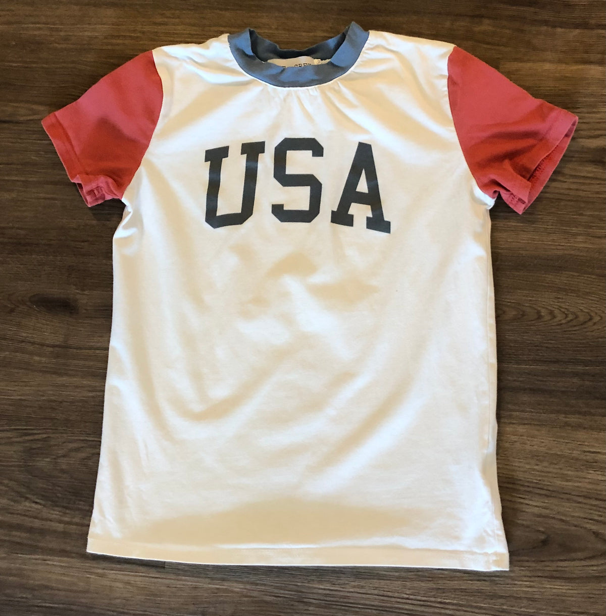 #137 USA tshirt size 10/12 (runs small IMO)
