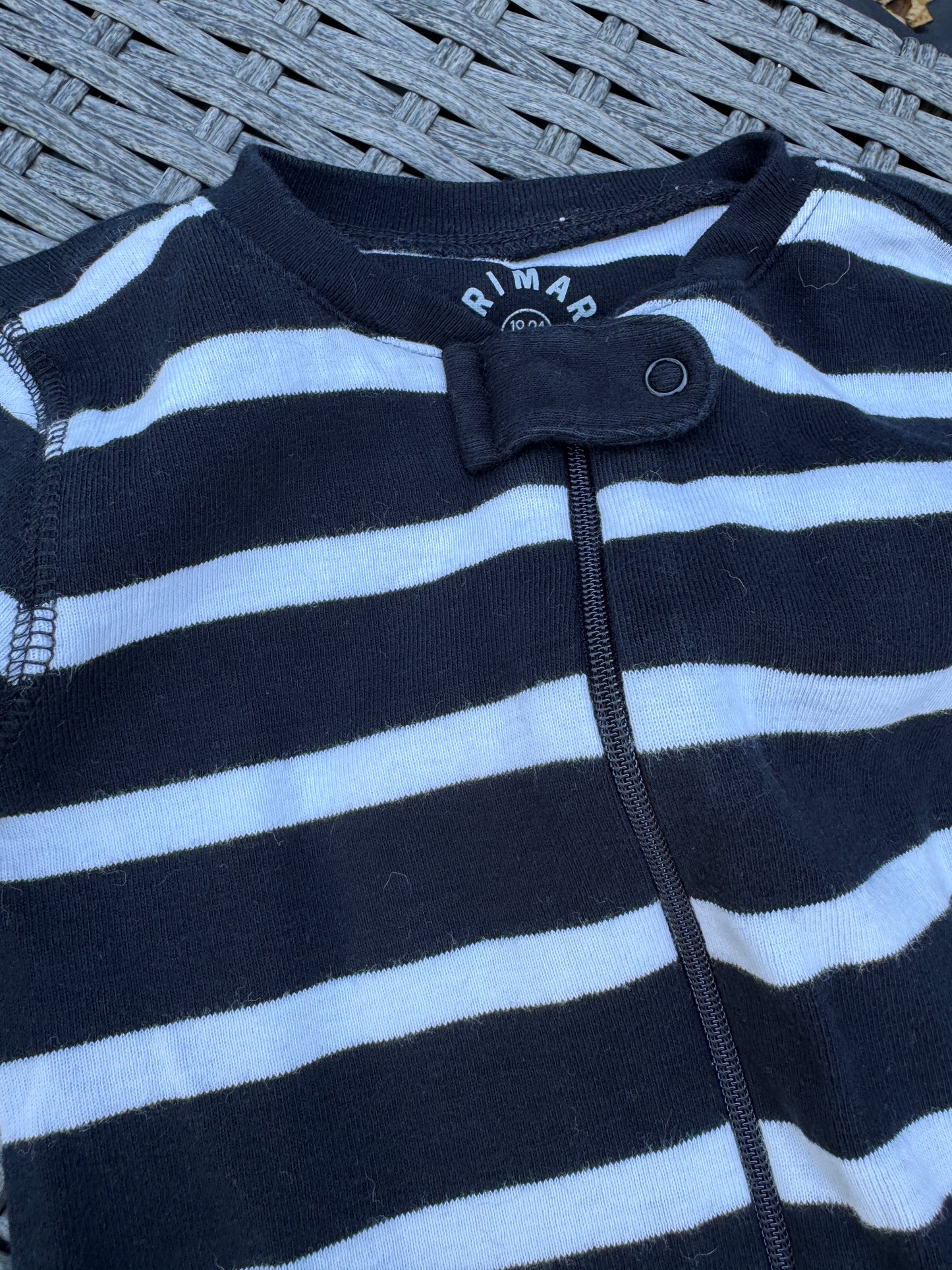Seller #22 - Primary black & white striped footed sleeper - size 18-24m - LIKE NEW