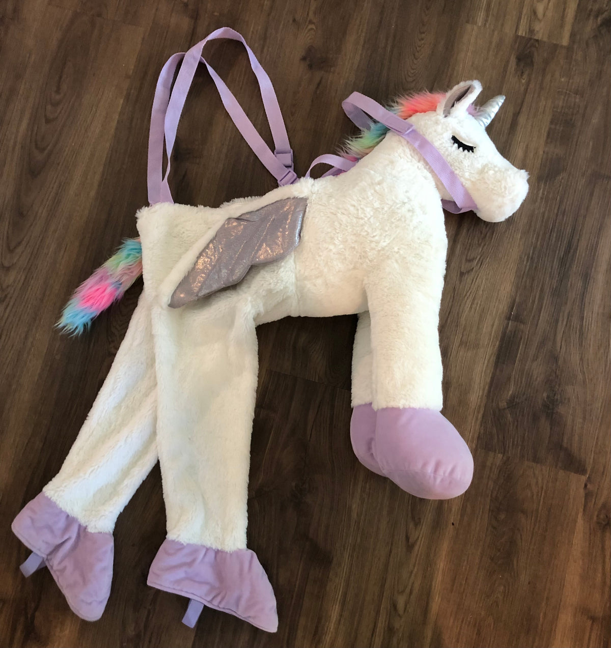 #137 Unicorn costume (says one size fits most age 18 months+) fits for a long time