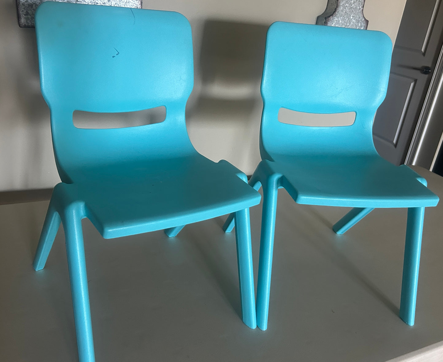 #34 blue plastic toddler chairs