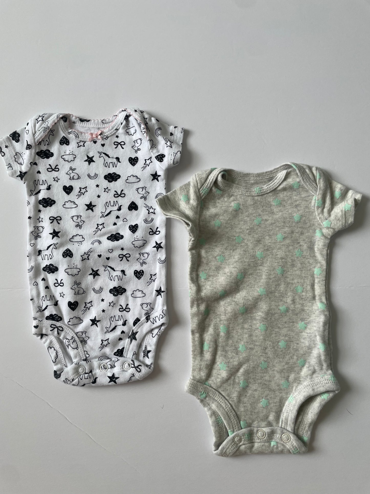 #3 Carters onesies 2-pack girls size NB