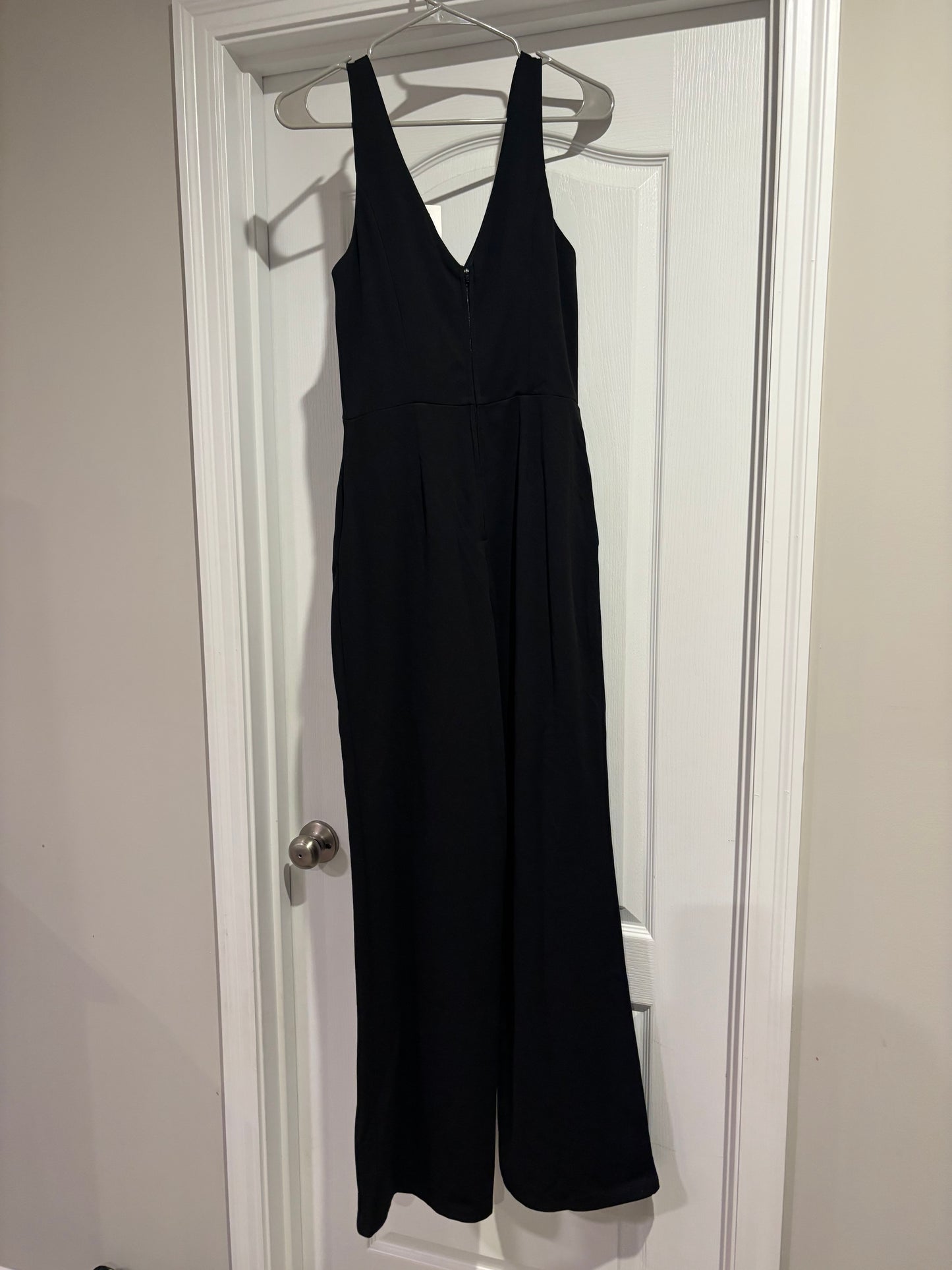Seller #2 NWT women’s black jumpsuit size M