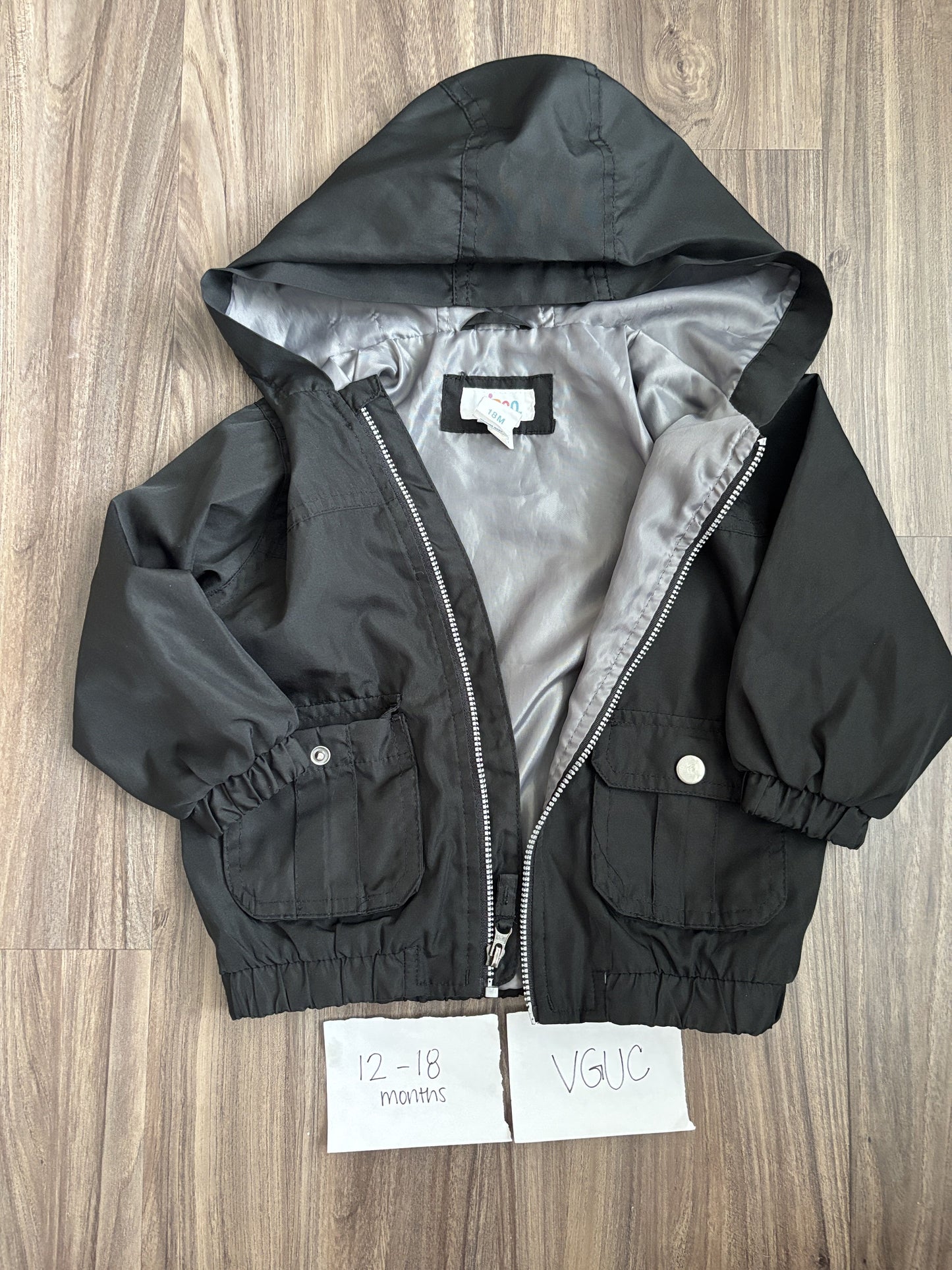 #138 - 12-18 Mo - VGUC Circo - Black Light Rain Jacket - PU 45236