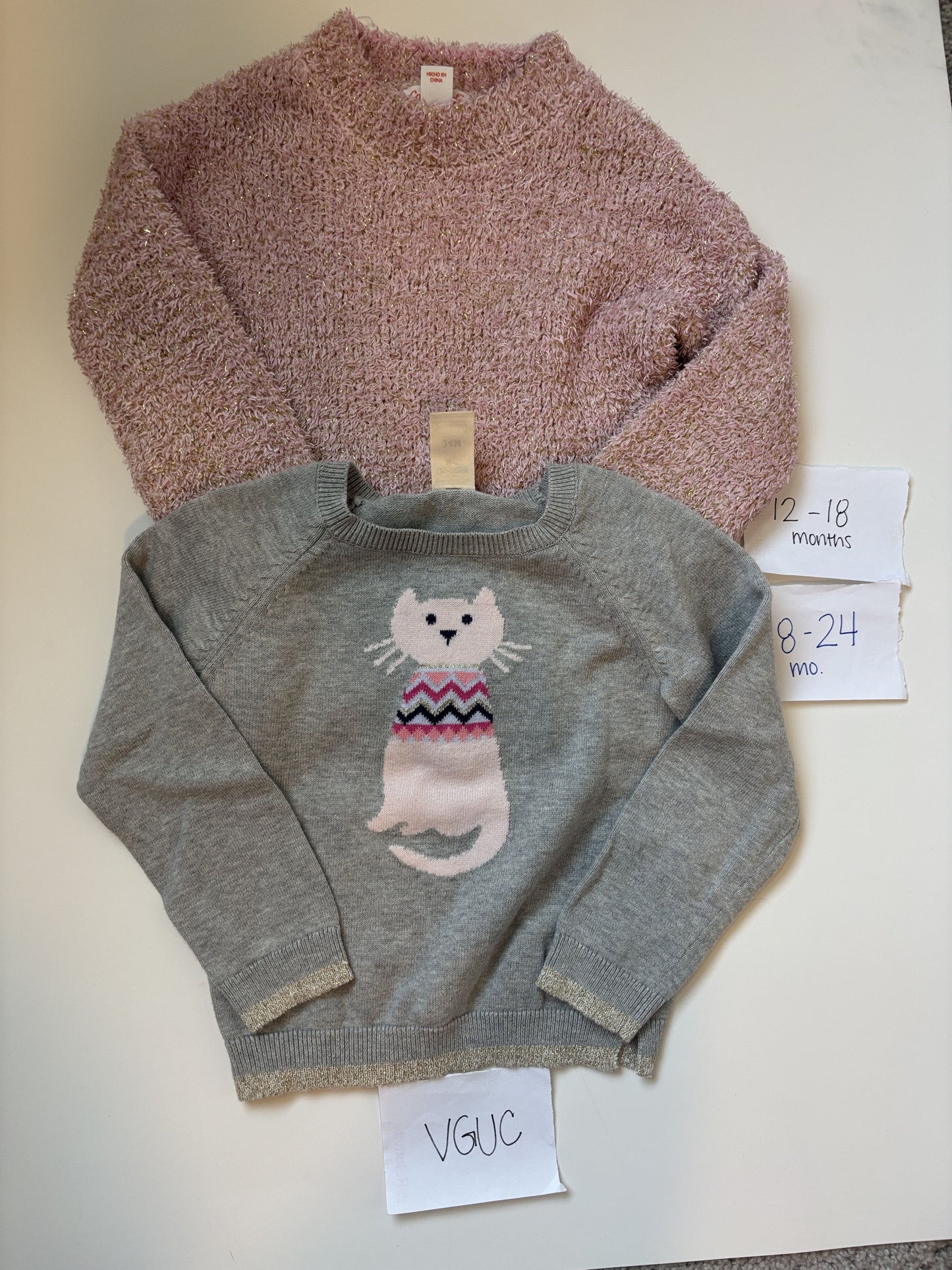 #138 - 12-18 Mo & 18-24 Mo - VGUC 2 Sweaters (Pink + Grey Cat - fits smaller) - PU 45236