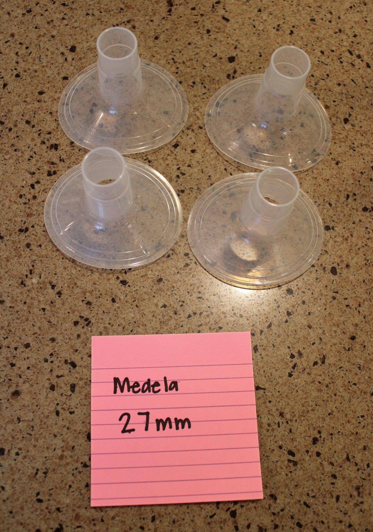 #168 Medela 27mm flanges - never used - set of 2