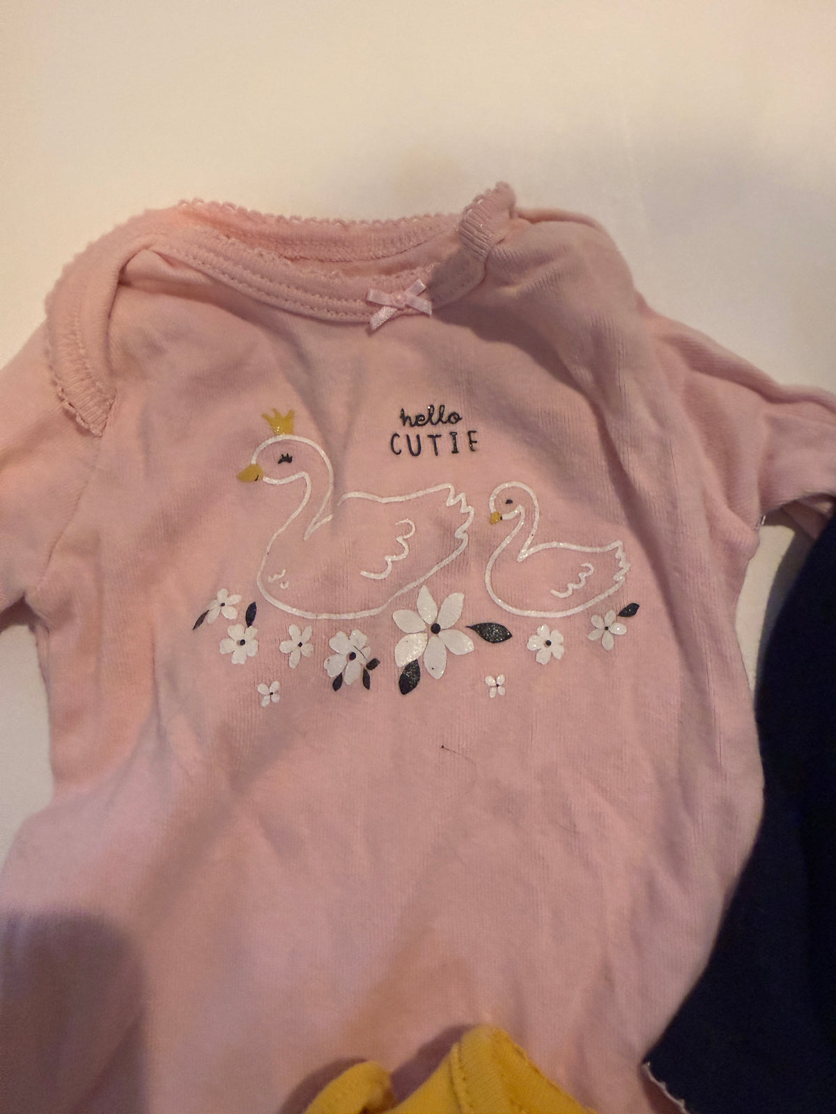#170 Carter’s body suit bundle (3)—yellow “Just so Llamazing: with llama, navy riddle sleeve “Extra cute all the time” and pink swans “hello cutie” girls 3 months