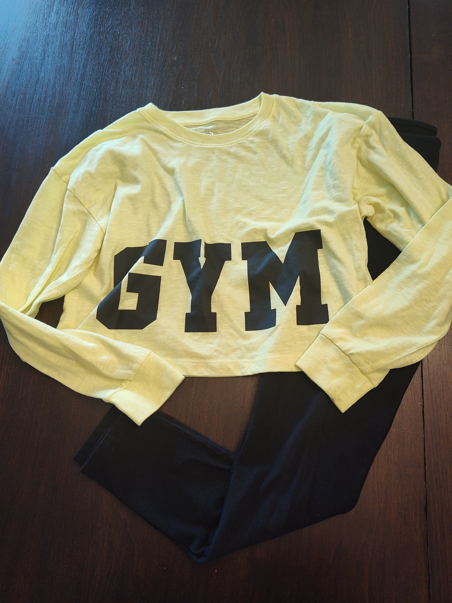 Seller 185: Girls size 14 gym outfit (black leggings yellow top)