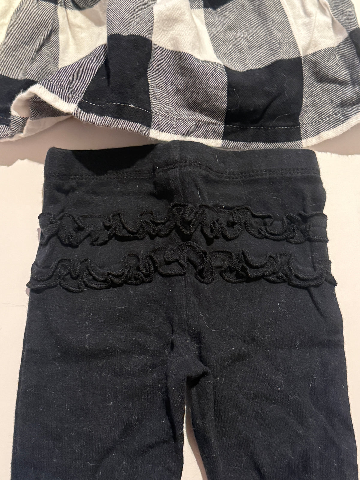 #170 Carter’s white and black flannel peplum top with black pants with ruffles on the butt girls 3 months