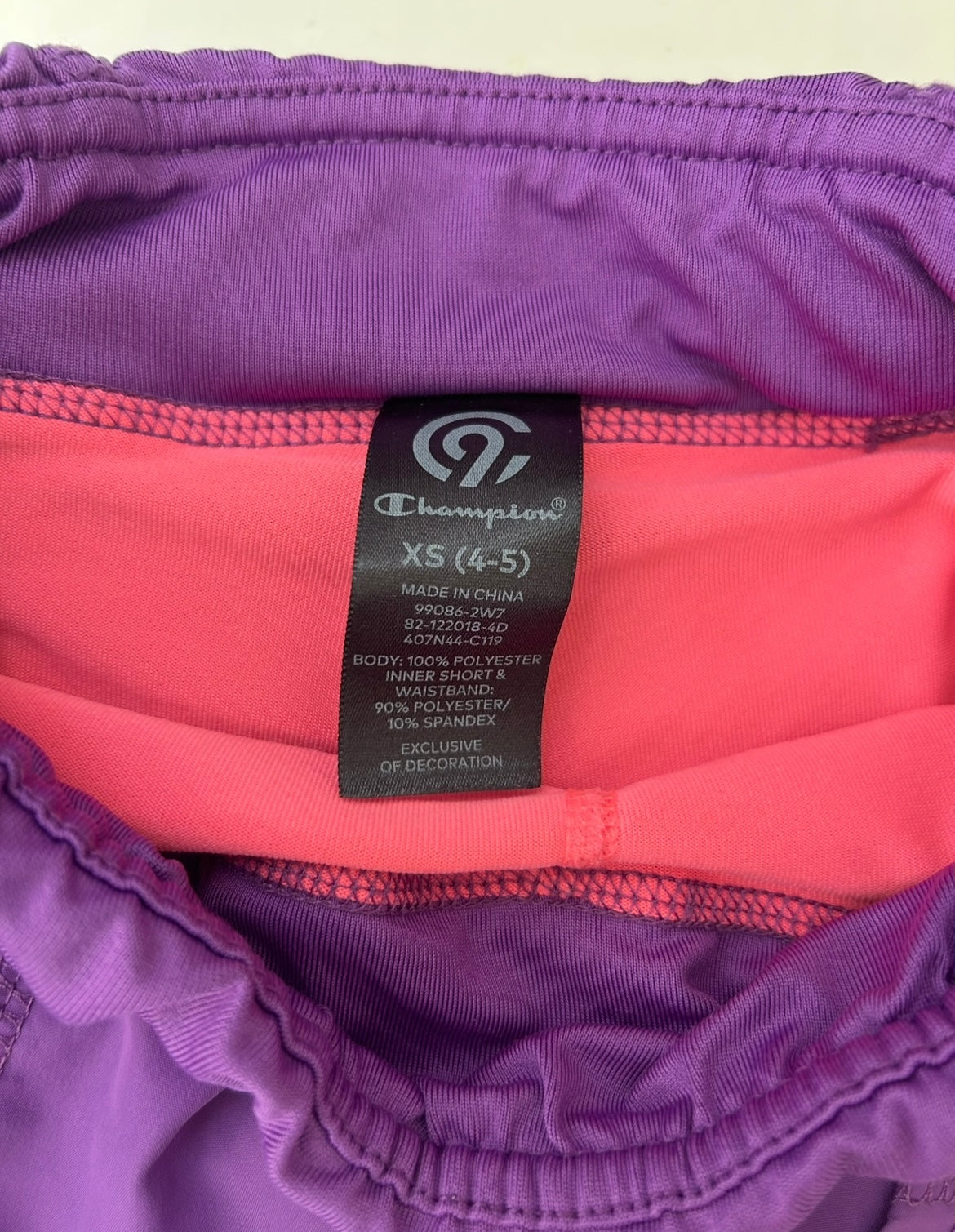#200 Girls size 4-5 purple skirt with pink undershort