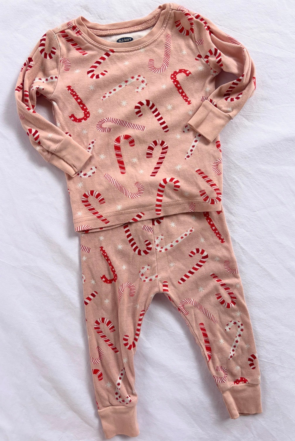 #119 Girls 12-18 month old navy candy cane pajamas