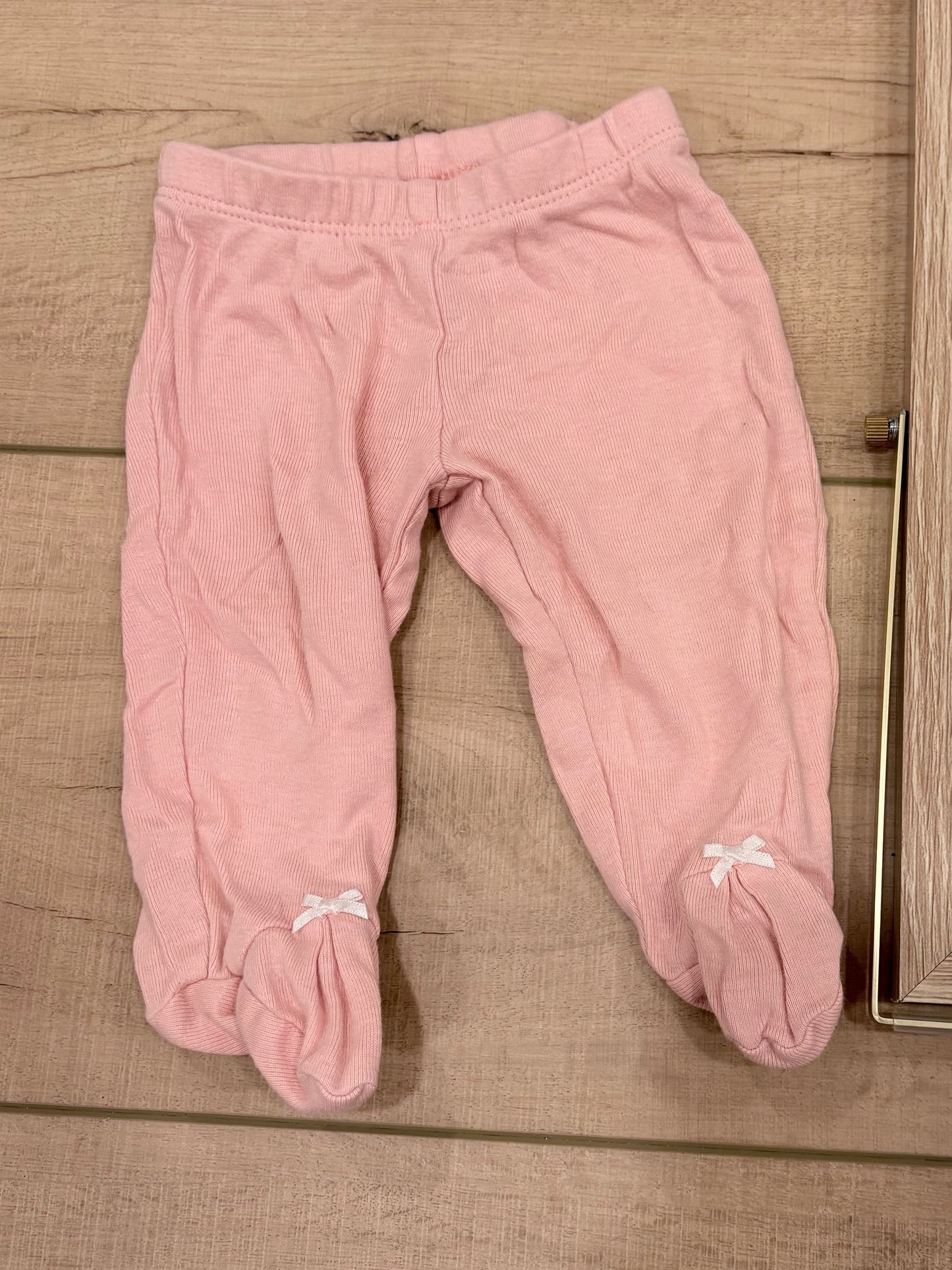 #37 0-3 Carter's Pink Footed Leggings with Bows