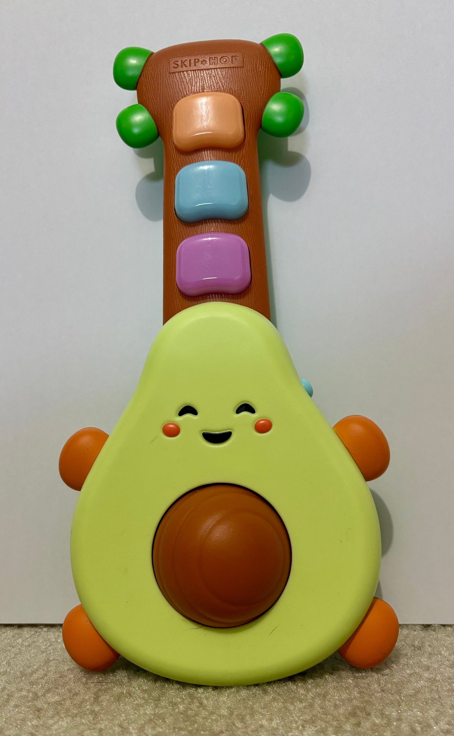 #132 - REDUCED - Skip Hop: Farmstand Rock-A-Mole Guitar Toy