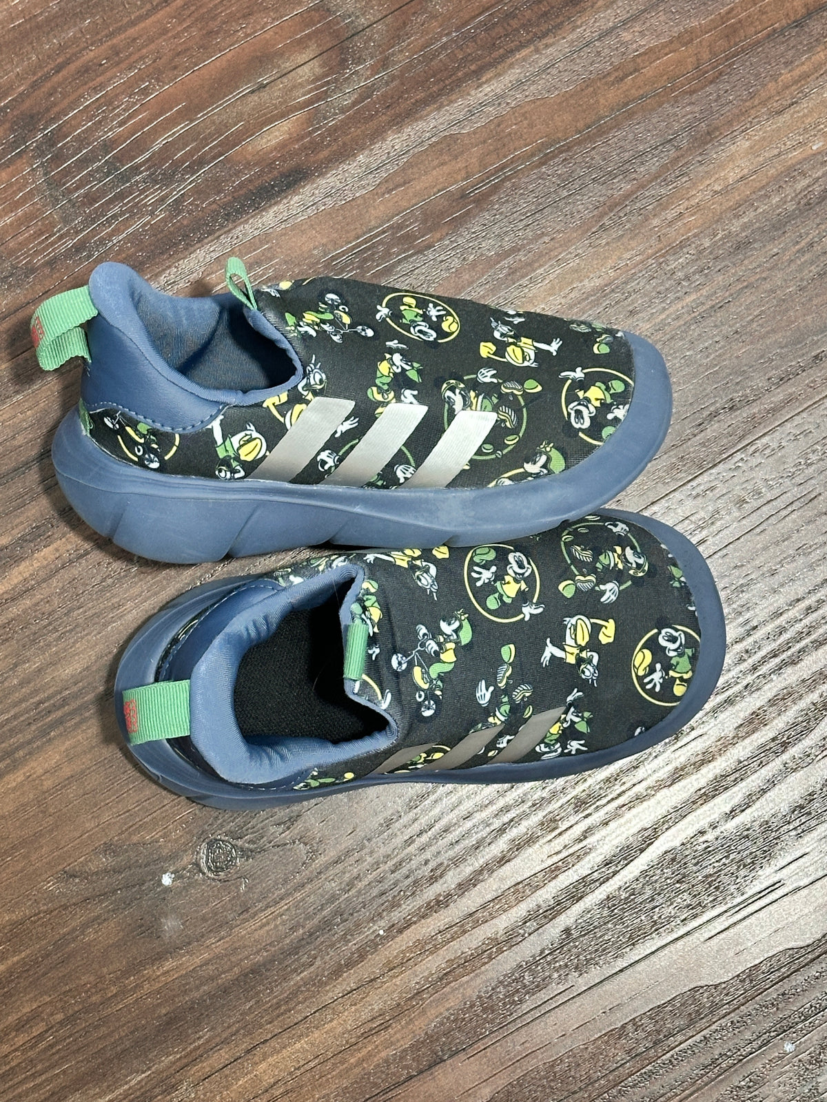 #48 Adidas Disney Slip on sneakers sz 9.5