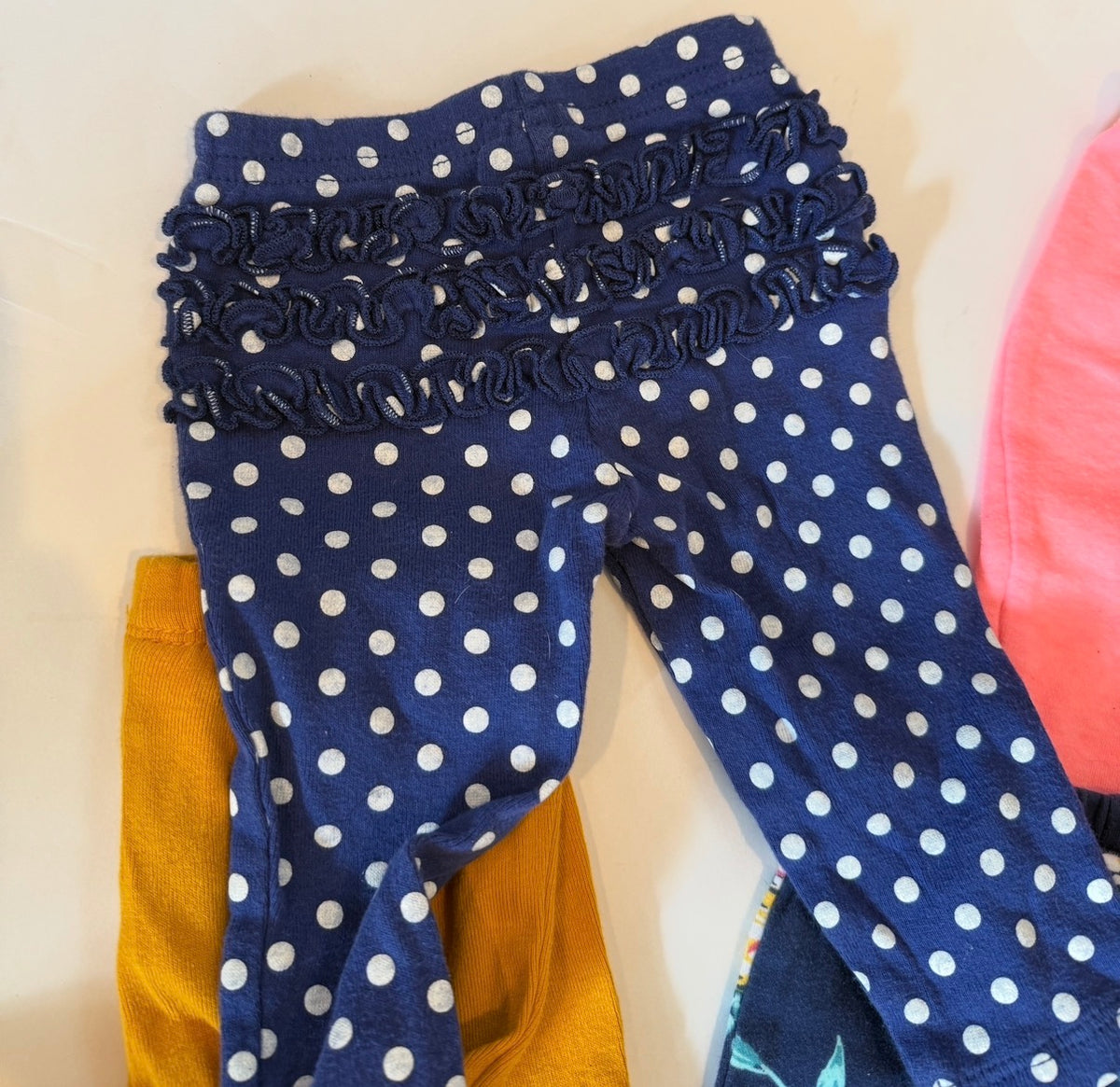 #170 Carters pants bundle (4)— yellow, blue and white polka dot ruffle bottom, floral and coral girls 3 months