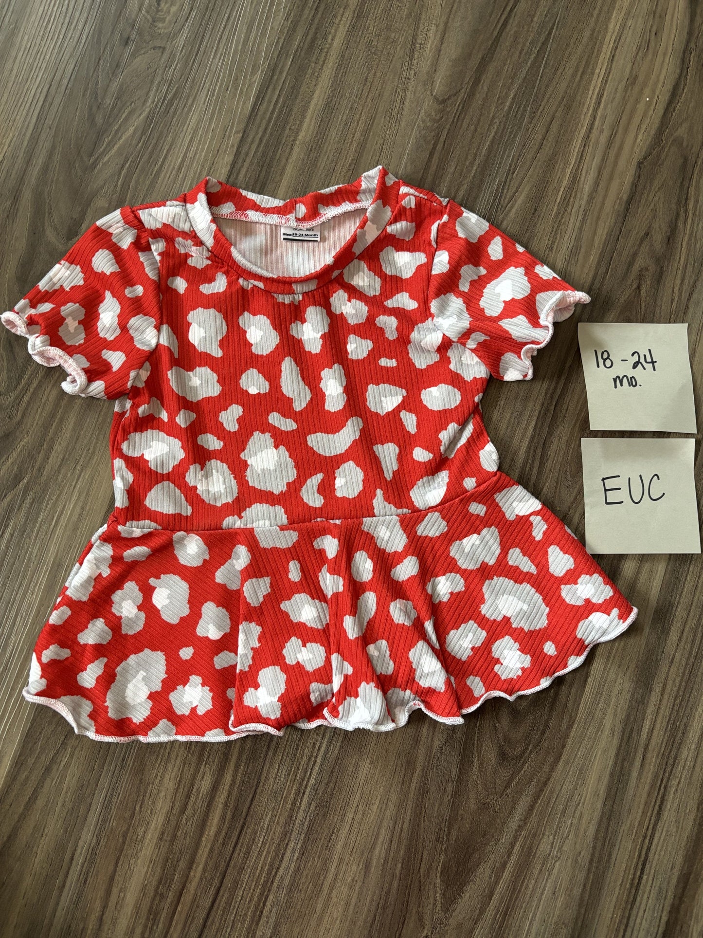 #138 - 18-24 Mo EUC Red Cheetah Print Peplum (perfect for Ohio State)