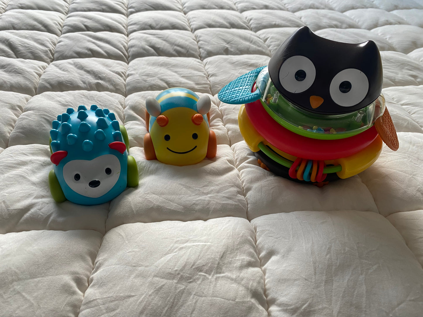 Seller 64 Skip Hop cars and owl stacker toy