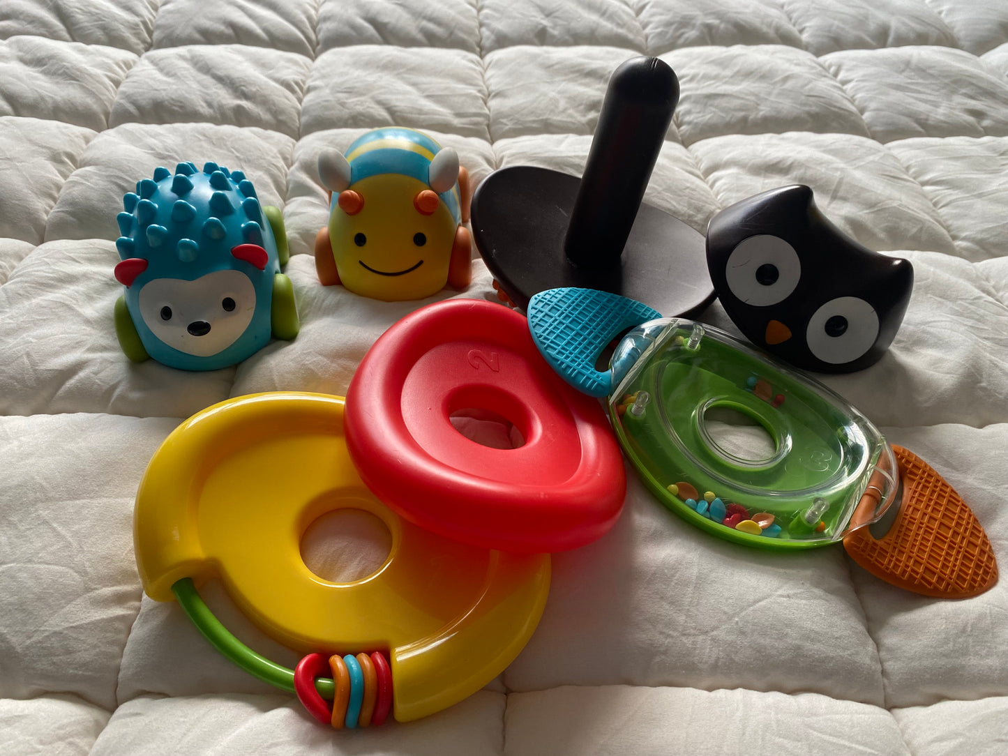 Seller 64 Skip Hop cars and owl stacker toy