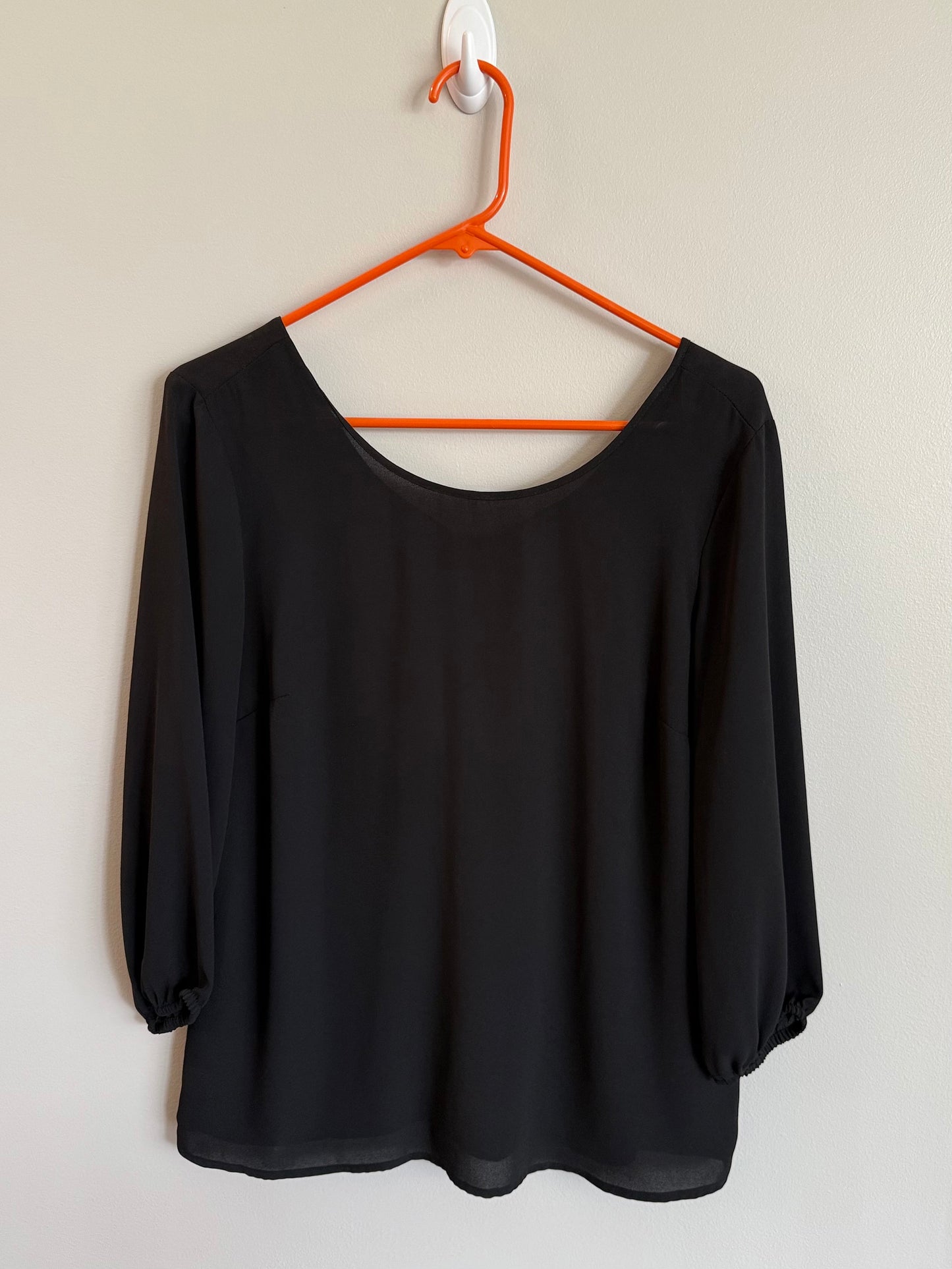 #173-women's black blouse (bow on back) size S